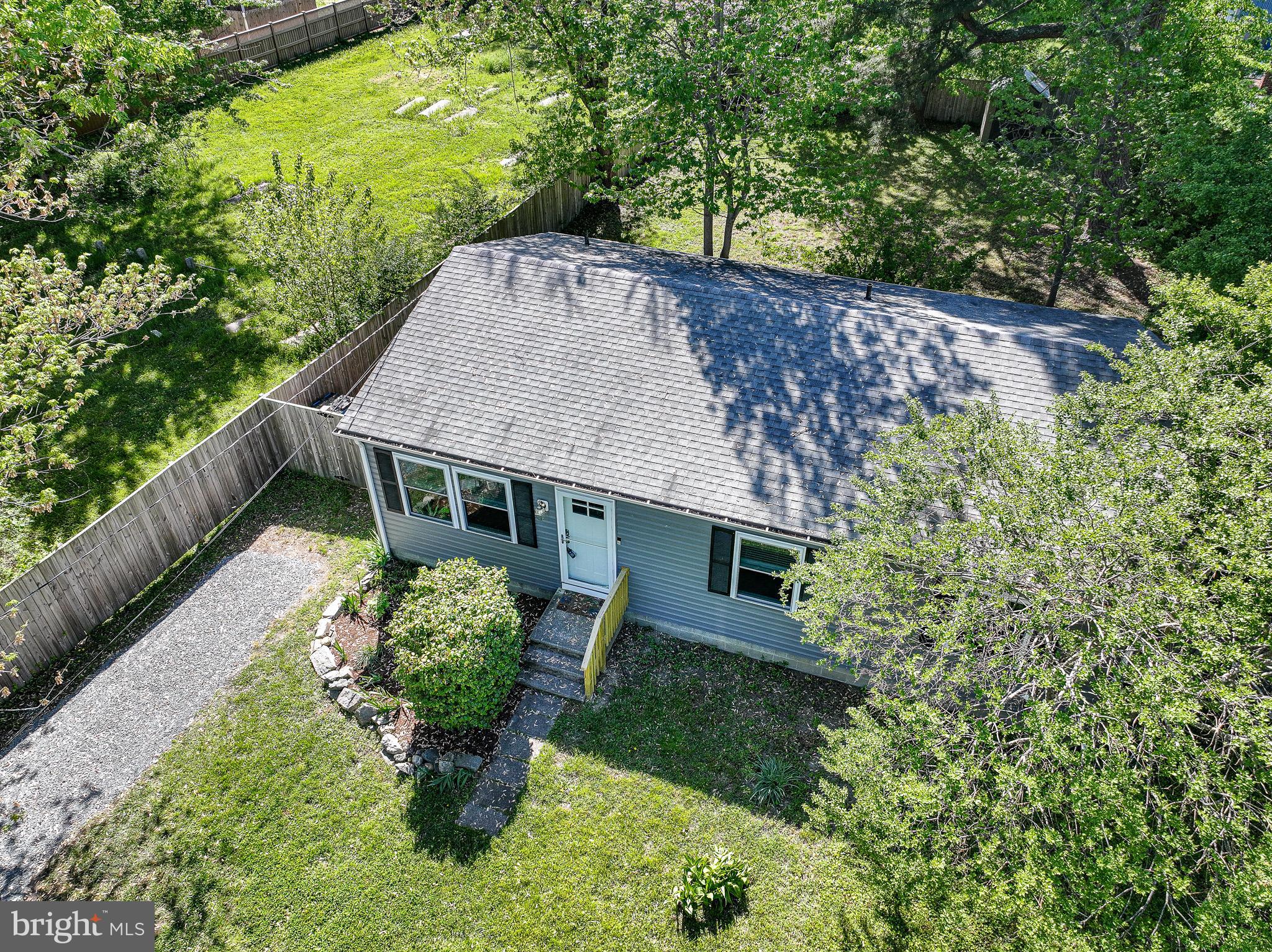 Welcome to this beautifully updated cottage in the heart of St. Michaels—where modern comfort meets Eastern Shore charm. Perfectly situated within walking distance to the town’s shops, restaurants, Rails to Trails, and the renowned Maritime Museum, this single‑level home offers both convenience and a peaceful, private setting. Sitting on nearly a quarter acre, the property features a fully fenced backyard with a 6‑ft wood privacy fence, creating an ideal space for outdoor living, pets, or quiet relaxation. Inside, the home presents like new with thoughtful upgrades throughout, including hardwood flooring, recessed lighting & fresh interior paint. The kitchen and bathrooms shine with quartz countertops, tile flooring, and modern finishes. The kitchen is equipped with stainless steel appliances, new cabinetry, quartz countertops, and an under‑sink water filtration system. A front‑loading Samsung washer and dryer and a 50‑gallon water heater add to the home’s move‑in‑ready appeal. Offering 3 bedrooms and 2 full bathrooms, this well‑designed floor plan provides comfortable single‑floor living in one of the Eastern Shore’s most desirable towns. Whether you’re seeking a full‑time residence, a weekend retreat, or an investment opportunity, this St. Michaels gem delivers style, convenience, and exceptional value. The driveway access is on N Talbot St. Please see agent remarks. Try before you buy with a minimum 4-month lease. Please see rental listing!