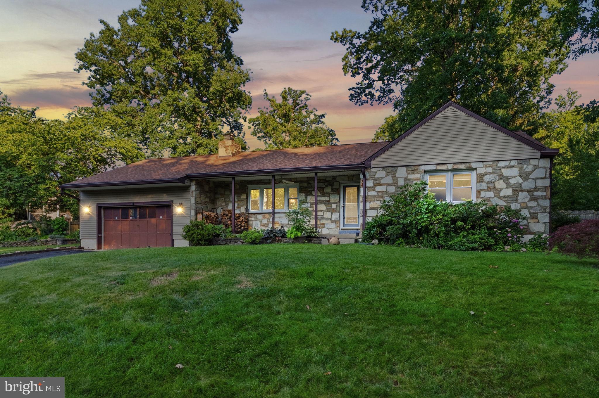 **LOCATED OFF OF SUSQUEHANNA ROAD ON WINDSOR AVENUE** Tucked away on a private drive just off Susquehanna Road, this charming ranch home offers the perfect blend of peaceful surroundings and convenient one-floor living. Major updates have already been completed, including a new roof (2023), oil tank (2024), central A/C (2025), well pump (2021), fresh interior paint (2026), and more, allowing you to move in with confidence and simply enjoy your new home.
Step inside to a spacious living room centered around a stunning floor-to-ceiling stone wood-burning fireplace-the perfect place to gather on chilly evenings. The fireplace was enhanced with a new box and liner in 2021 for added peace of mind. Luxury vinyl plank flooring installed in 2023 flows throughout the main living areas, creating a seamless and modern feel. The living room opens effortlessly into the dining area and kitchen, making both everyday living and entertaining easy. Just off the kitchen, you'll find a convenient powder room, direct access to the deck, and entry into the attached two-car garage.
The bedroom wing features three generously sized bedrooms and a well-appointed full hall bathroom. The expansive primary bedroom offers outstanding potential to create a true owner's retreat, with ample space to add a walk-in closet and a second full bath, allowing you to customize the space into a luxurious primary suite.
The expansive finished lower level spans nearly the entire footprint of the home and offers incredible flexibility. Whether you're hosting game days, creating a home theater, setting up a playroom, or working remotely, you'll appreciate the large recreation area, private office or bonus room, and multiple storage spaces.
Outside, the property truly shines. In addition to the backyard, the home is complemented by two spacious side yards, all surrounded by mature landscaping that creates a private, park-like setting with plenty of room to relax, entertain, garden, or play.
Located in the highly sought-after Upper Dublin School District, this home offers an exceptional combination of privacy and convenience. Enjoy easy access to shopping, dining, parks, SEPTA regional rail, the Pennsylvania Turnpike, and Route 309, making commuting to Philadelphia and surrounding suburbs a breeze. With thoughtful updates throughout, fresh neutral paint, tremendous potential to create your dream primary suite, and a setting that's rarely found, this move-in-ready home is ready to welcome its next owner. Join us for an open house Saturday June 27th & Sunday June 28th both from 11-1pm!
