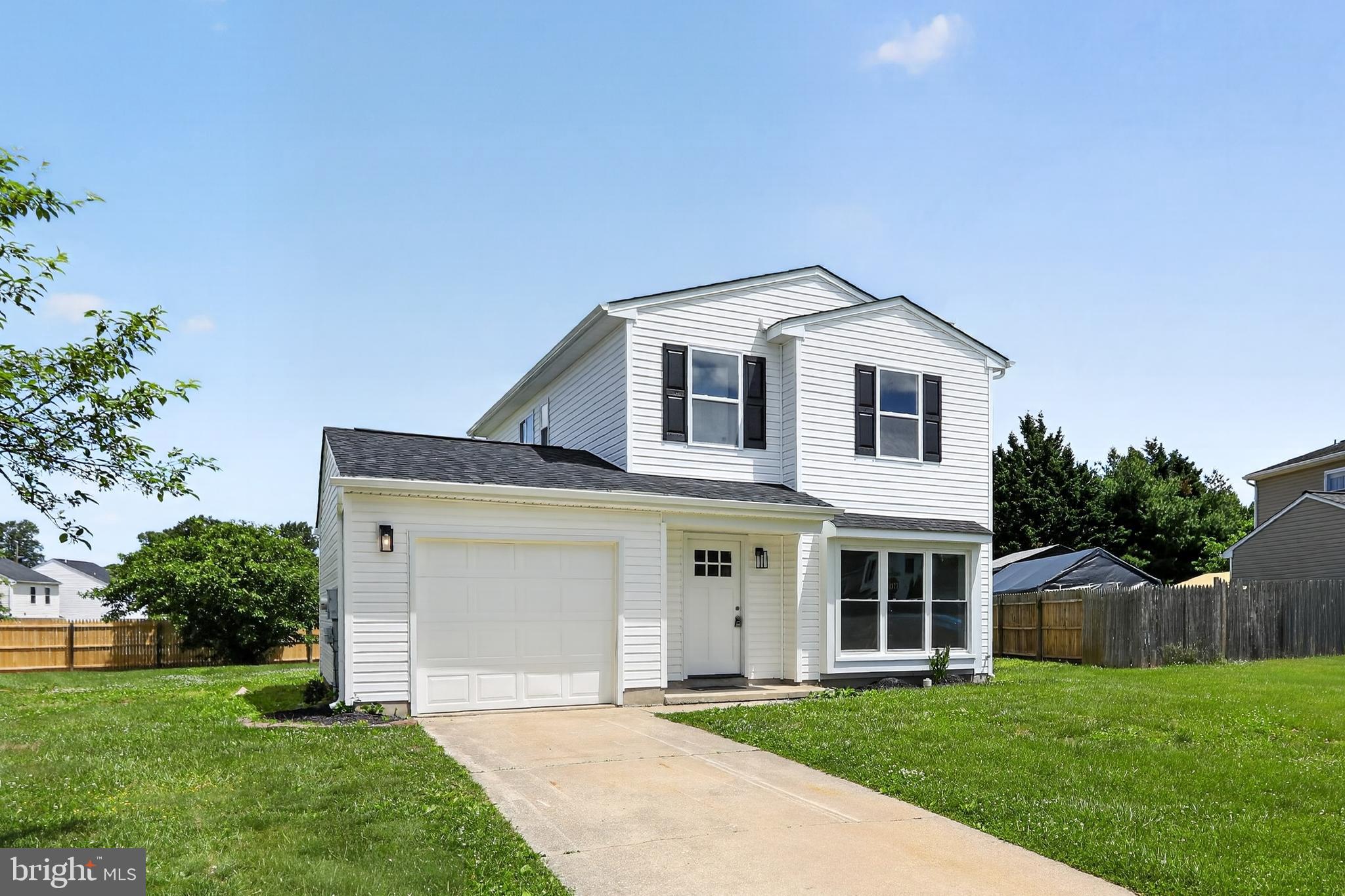 ***OPEN HOUSE THIS SUNDAY JUNE 7TH FROM 1PM to 3PM!!*** Welcome to 3 Bergen Court, a beautifully renovated Colonial tucked away on a quiet cul-de-sac in the desirable Wellington Woods community of Newark. Thoughtfully updated from top to bottom, this move-in ready residence offers the perfect combination of modern style, everyday comfort, and a convenient location close to everything you need. From the moment you arrive, the home's covered front entrance, fresh exterior updates, and attractive curb appeal create a warm and inviting first impression. Step inside to discover 1,375 square feet of bright, refreshed living space highlighted by luxury vinyl plank flooring, fresh neutral paint, recessed lighting, and an open, flowing layout designed for today's lifestyle. Natural light pours through the large windows of the spacious living room, creating a welcoming atmosphere that's perfect for both relaxing evenings and entertaining guests. At the heart of the home, the stunning new kitchen showcases timeless white cabinetry, elegant quartz countertops, an eye-catching arabesque tile backsplash, stainless steel appliances, and stylish matte black fixtures. Whether preparing a quick meal or hosting friends and family, this beautifully designed space is sure to impress. A convenient door from the kitchen leads directly to the freshly painted rear deck, providing the ideal setting for outdoor dining, summer barbecues, or simply enjoying the peaceful backyard. The main level is rounded off by a convenient and completely rehabbed powder room appointed with tile floors, clean white vanity, and black hardware. Upstairs, the comfortable primary bedroom offers plush carpeting, overhead lighting, a ceiling fan, and a walk-in closet. Two additional bedrooms provide flexibility for family, guests, a home office, or hobby space. The updated hall bathroom features a large tub and shower combination, complemented by an attractive vanity and modern mirror. Additional highlights include a newly installed roof, new HVAC, new exterior doors, an attached one-car garage with interior access, and driveway parking for added convenience. Situated on a low-maintenance 0.17-acre lot, the backyard provides ample outdoor space without the burden of extensive upkeep. Residents will appreciate being just minutes from shopping, dining, parks, major commuting routes, and everything Newark has to offer. Offering stylish renovations, practical living spaces, and a sought-after neighborhood setting, 3 Bergen Court presents an exceptional opportunity to own a turnkey home in Wellington Woods.Schedule your showing today!