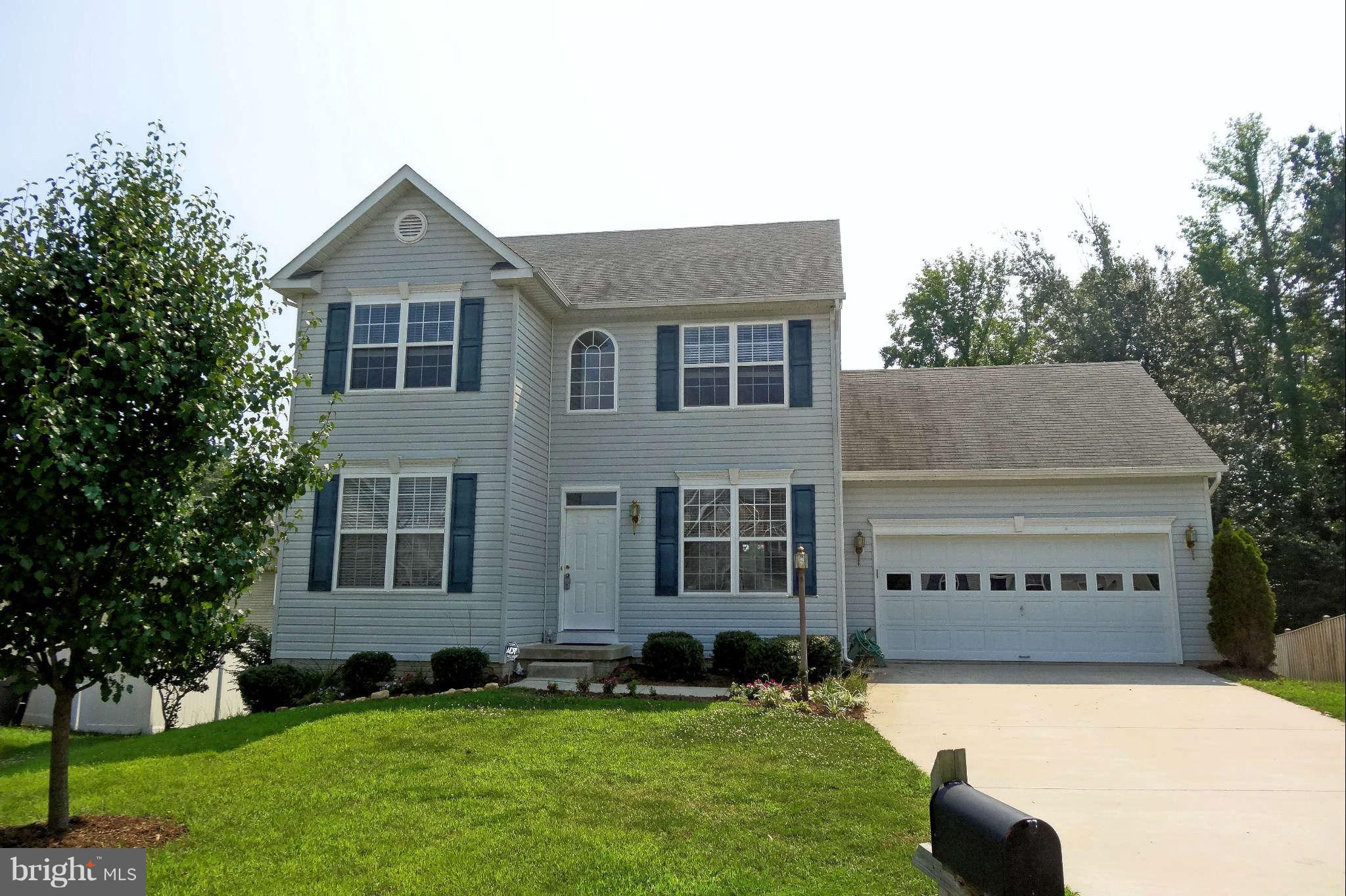 Available quickly! Cheery KT w/hickory cabinets, gas stove, microwave, brkfst area. Chair rail & crown molding in DR. Family rm plus living room/office. Good-sized MBR, bath w/soak tub & sep shower. Finished bsmt w/rec room plus 4th BR, 3rd full bath. Plantation blinds, washer & dryer provided. Huge deck, 2-car garage, yard backs to trees. Pets case-by-case, no smokers. Easy commute to NAS PAX!