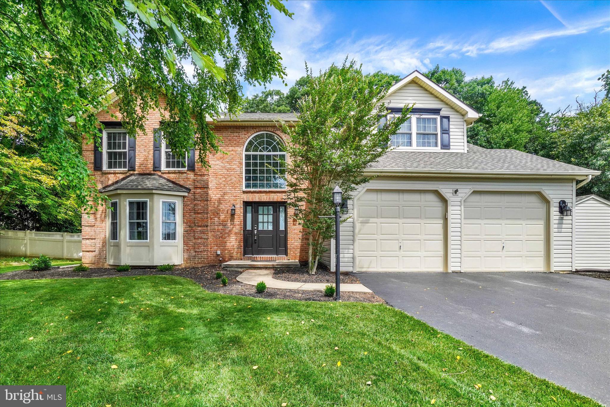 Welcome to 119 Meadow Hill Drive! This spacious brick-front, 4-bedroom, 2.5-bath home offers a thoughtful floor plan and plenty of room to spread out, both inside and out.
The large kitchen with pantry opens to the family room, creating a comfortable gathering space highlighted by a beautiful stone gas fireplace. The main level also features a formal dining room, living room, powder room, and convenient first-floor laundry. Step outside through the sliding doors to the covered patio overlooking the large, level fenced backyard. Whether you're enjoying your morning coffee, hosting a summer cookout, or simply relaxing at the end of the day, this outdoor space is sure to be enjoyed throughout the seasons. Upstairs, you'll find four bedrooms, a full hall bath, and a spacious primary suite featuring vaulted ceilings, a sitting nook, his-and-her closets, a private bath, and a built-in wall safe. The partially finished lower level provides additional living space that could serve as a game room, recreation room, home gym, office, or second family room. An unfinished area offers plenty of storage space. Additional highlights include a newer gas furnace and an oversized two-car garage with extra height to accommodate larger vehicles, trucks, or additional storage needs. Also the home features a NEW air condition and furnace as of 1/25 and a NEW roof of 4/25. Conveniently located in the Red Lion Area School District and close to shopping, dining, and major commuter routes, this home combines space, functionality, and comfort in a desirable location. Schedule your private showing today!
