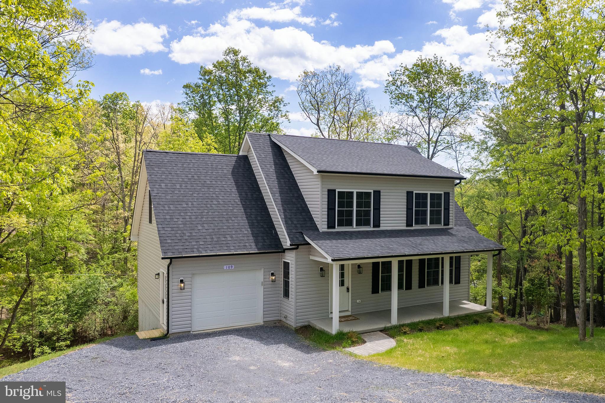 Low-maintenance new construction—no updates needed! Perfect for weekend lake living or simply downsizing to one level! Welcome to Lake Holiday living—where everyday life feels like a getaway.
This brand-new 3-bedroom, 2-bath Cape Cod is perfectly situated on a quiet cul-de-sac in the gated Lake Holiday community, offering the rare opportunity to own new construction without the wait. Designed for both comfort and convenience, the home features a sought-after main-level primary suite with a walk-in closet, dual vanities, and a beautifully tiled walk-in shower. The open-concept main living area is filled with natural light and connects seamlessly to a well-appointed kitchen with granite countertops, shaker-style cabinetry, stainless steel appliances, and a center island—ideal for everyday living or entertaining. Upstairs, you’ll find two generously sized bedrooms and a full bath, providing flexible space for guests, family, or a home office. Enjoy your morning coffee or unwind in the evenings on the 26-foot covered front porch, taking in the peaceful, wooded surroundings. The full walkout basement with rough-in plumbing offers 800+ square feet of future living space—ready to finish to suit your needs. Located just 15 minutes from Winchester, Lake Holiday offers an unmatched lifestyle with private lake access, beaches, boat docks, clubhouse, fitness center, tennis courts, and more—all within a secure, gated community. If you’ve been considering new construction, this is your chance to skip the build time and move right in. Check out our 3-D tour and Lake Holiday video attached to this listing! Builder will add deck with acceptable offer. Builder warranty included.