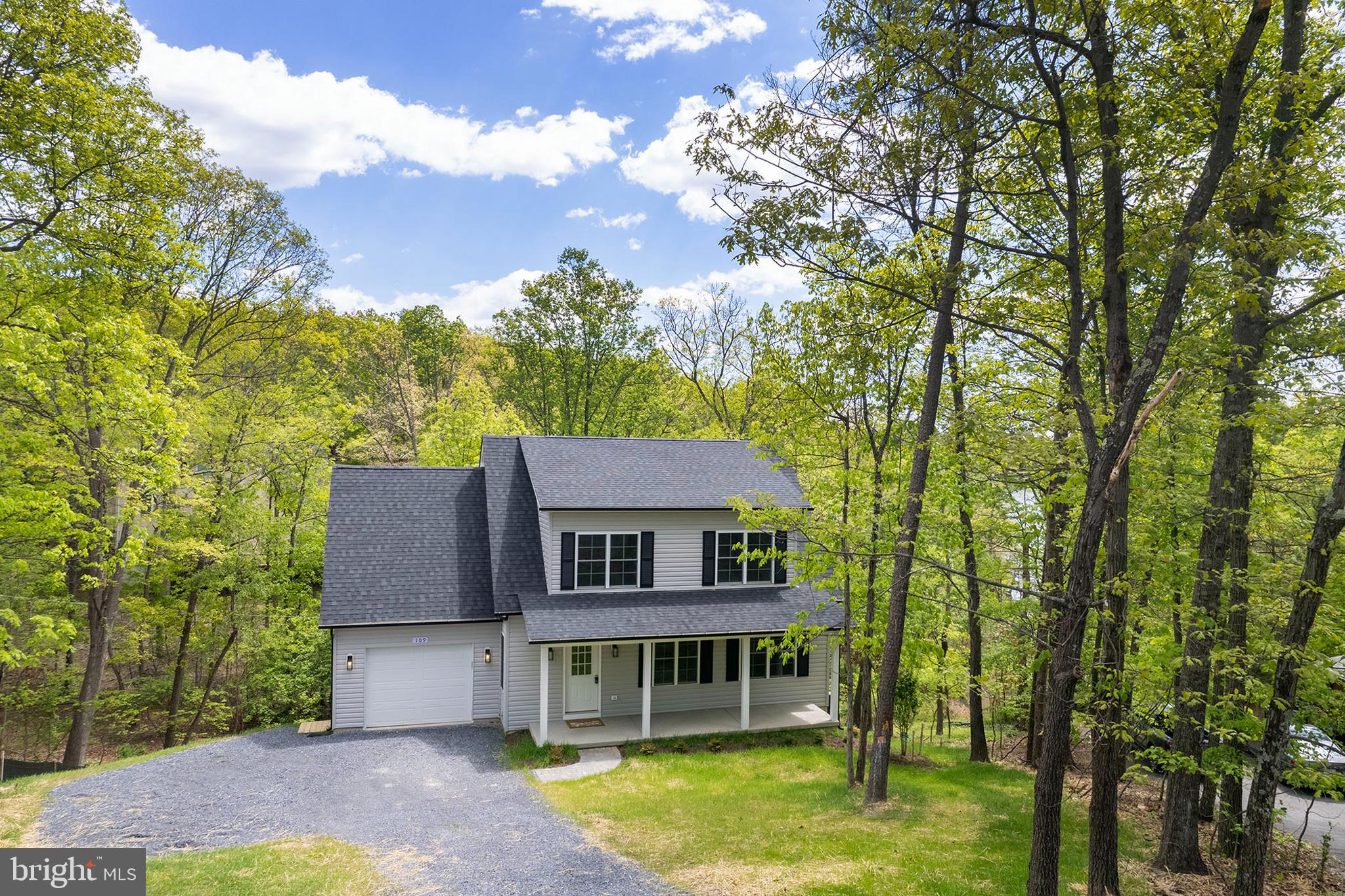 Low-maintenance new construction—no updates needed! Perfect for weekend lake living or simply downsizing to one level! Welcome to Lake Holiday living—where everyday life feels like a getaway.
This brand-new 3-bedroom, 2-bath Cape Cod is perfectly situated on a quiet cul-de-sac in the gated Lake Holiday community, offering the rare opportunity to own new construction without the wait. Designed for both comfort and convenience, the home features a sought-after main-level primary suite with a walk-in closet, dual vanities, and a beautifully tiled walk-in shower. The open-concept main living area is filled with natural light and connects seamlessly to a well-appointed kitchen with granite countertops, shaker-style cabinetry, stainless steel appliances, and a center island—ideal for everyday living or entertaining. Upstairs, you’ll find two generously sized bedrooms and a full bath, providing flexible space for guests, family, or a home office. Enjoy your morning coffee or unwind in the evenings on the 26-foot covered front porch, taking in the peaceful, wooded surroundings. The full walkout basement with rough-in plumbing offers 800+ square feet of future living space—ready to finish to suit your needs. Located just 15 minutes from Winchester, Lake Holiday offers an unmatched lifestyle with private lake access, beaches, boat docks, clubhouse, fitness center, tennis courts, and more—all within a secure, gated community. If you’ve been considering new construction, this is your chance to skip the build time and move right in. Check out our 3-D tour and Lake Holiday video attached to this listing! Builder will add deck with acceptable offer. Builder warranty included.