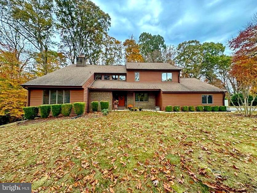 Welcome to 8150 Plowden Dr, a stunning custom built home nestled in the serene community of La Plata, MD. This exquisite property is sited on 2.78 acre lot and offers an expansive and thoughtfully designed layout, ideal for both entertaining and everyday living. 

Upon entering, you'll be greeted by a warm sophistication throughout the house. The main level features a large family room with fireplace and sunken conversation area, all season sunroom with beautiful views and sliding doors to deck, large living area with cathedral ceilings and fireplace, dining room, remodeled kitchen with new appliances, double oven, quartz countertops, island, and walkout to large deck, 2 half baths, laundry area and access to garage and lower level.
  
The upper level boasts a large primary suite with full bath, double vanities, large shower, 2 closets, and sitting room with fireplace. There are three additional  bedrooms and a full bath offering ample space for family and guests. Each bedroom has generous closet space. Attic storage with pull down stairs and linen closet with laundry shoot complete the upper level.

The lower level is fully finished with a murphy bed unit, sitting area, office set up, full bath, and sliding doors to walkout. Perfect for a home office, guests, or in-law suite. 

Step outside to discover the wooded back yard with 40 foot deck and 12x12 custom built storage shed an ideal space for outdoor activities, privacy, and relaxation. Additional features/upgrades include 2.5 car garage with new doors, new cabinet units and vinyl flooring. This home is close to your choice of grocery stores, shopping, and restaurants. Also convenient to DC and VA. 

Don't miss the opportunity to make this remarkable property your own. Experience the perfect blend of comfort, style, and functionality at 8150 Plowden Drive. Schedule your private tour today and envision the possibilities that await in this beautiful home.