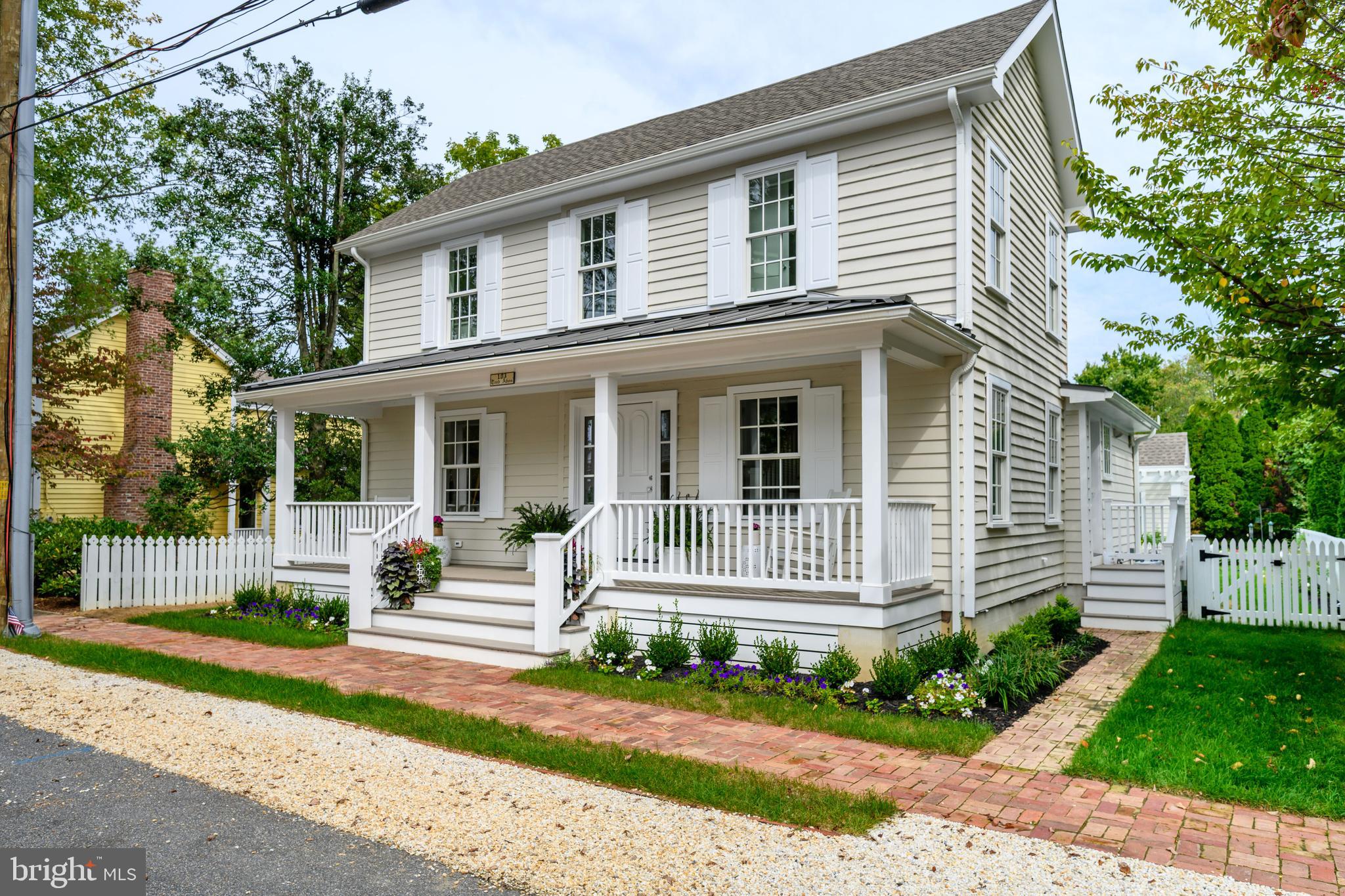 Tucked in a lovely Oxford location just steps from in-town amenities, this completely redone 4 bedroom, 3.5-bath residence offers quaint Eastern Shore living with exceptional charm and flexibility. The light-filled main home features a formal dining room, private office/bedroom, inviting family room with gas fireplace and wet bar with custom built-ins, and a top-of-the-line gourmet kitchen with cathedral ceiling, generous cabinetry, center island, and an adjacent mudroom with additional appliances. Upstairs, the spacious primary suite overlooks the beautifully landscaped rear grounds , pool and features vaulted ceilings, custom built-ins, and a walk-in closet. There is a comfortable guest bedroom and full bath. Outdoor living features a fabulous rear deck overlooking an in-ground swimming pool and manicured gardens—perfect for entertaining or quiet relaxation. A separate guest cottage with murphy bed, full bath and kitchenette adds even more versatility, ideal for guests, extended stays, or a private retreat. Only a couple blocks to town owned waterfront, shops, restaurants, parks, marinas and the local market. Move in ready home.