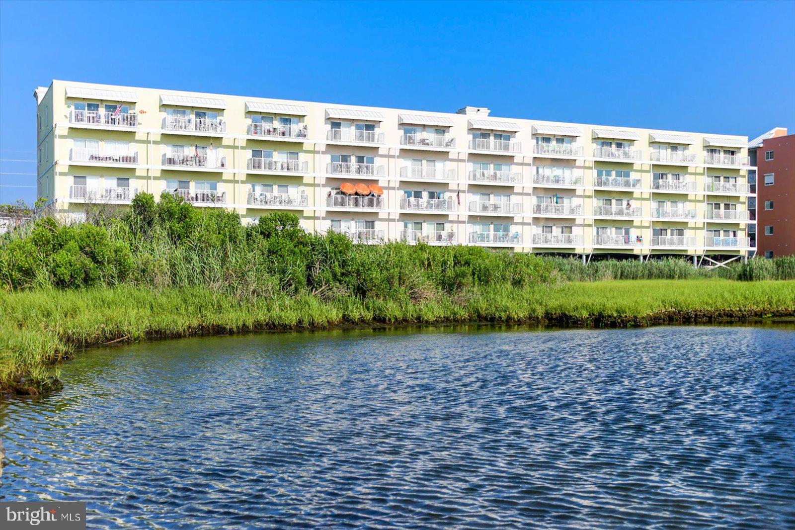DIRECT BAYFRONT LUXURY at The Maresol – Ocean City’s Premier Bayside Building!
Unit 501 is a beautifully updated 3-bedroom, 2-bath direct bayfront condo boasting some of the most spectacular sunset views in all of Ocean City. Perched on the bay in the highly sought-after mid-town 56th Street location, this is one of the nicest buildings on the water—and it shows.
Step out your door and you’re literally steps from the private crosswalk at 56th Street, making trips to the pristine Atlantic beaches safer and faster than almost anywhere else in town—no long walks up or down Coastal Highway required.

Completely turn-key and tastefully upgraded by the current owners with new flooring, fresh paint, modern fixtures, a new water heater, and more, this condo is ready for your family to enjoy or to start generating impressive rental income immediately. The Maresol itself underwent major renovations just 5–6 years ago—including all-new walkways, railings, stairs, and building systems—so everything feels fresh, modern, and meticulously maintained with no big assessments on the horizon.
•