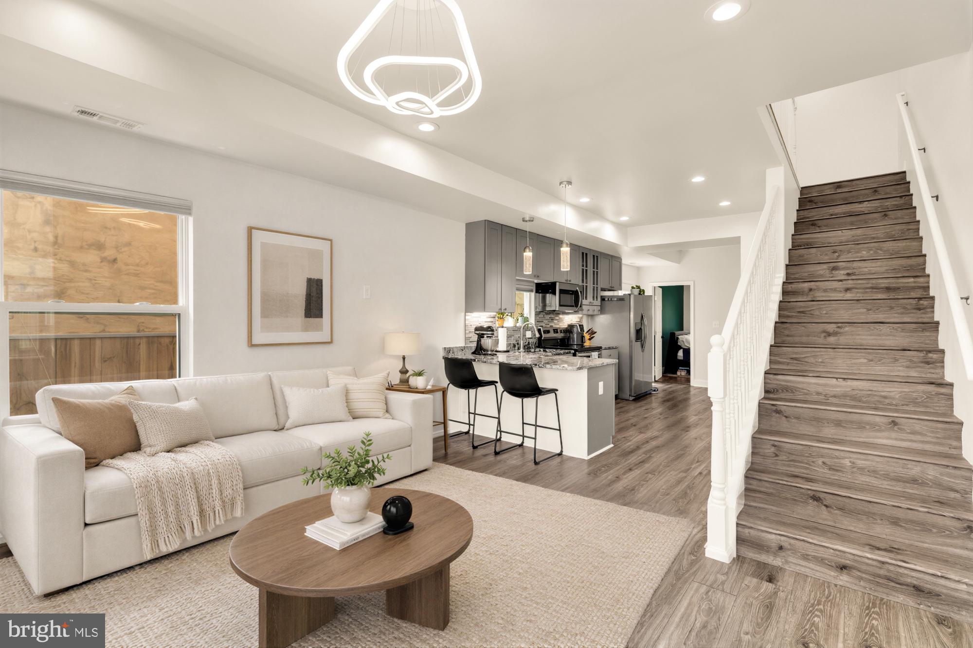 Step inside a home where modern design meets effortless flow and forward-thinking efficiency. The main level is anchored by an open living and dining area that spills into a kitchen made for morning coffee and easy conversation, featuring a breakfast bar that comfortably seats three. Tucked away at the rear, you’ll find a versatile bedroom and full bath—the ultimate setup for a quiet home office, a cozy guest suite, or a private space for in-laws.

From here, the transition to the outdoors is seamless. Step out into a lush, fully fenced backyard that’s been perfectly leveled with fresh sod. Whether you're grilling under the custom removable shade or hosting friends against the backdrop of professional landscaping, this space feels like a private sanctuary. There’s even a custom shed that matches the house for stylish storage.

Upstairs, the layout is just as thoughtful. The owner’s suite is a true retreat, boasting front-facing windows that flood the room with light, dual closets, and a spa-inspired bath. Two additional bedrooms across the hall offer the flexibility you need for a nursery, gym, or creative studio, all served by a second beautifully renovated full bath and a convenient laundry nook with stacked appliances.

What truly sets this home apart is its commitment to modern living and sustainability. Newly installed solar panels crown the roof, offering a significant boost in energy efficiency and a welcome reduction in monthly utility costs. These are paired with high-end touches like custom blackout shades, sleek glass shower doors, and dimmable ceiling fans for the perfect ambiance. Plus, with a Nest thermostat and security system already in place, the home is as smart as it is stylish.

Located right on the DC/Maryland border, you get the best of both worlds—quiet residential charm with instant access to city conveniences, local shops, and neighborhood parks. With ample free street parking right outside your door, this is the functional, eco-conscious masterpiece(Solar Panels!) you’ve been waiting for. -