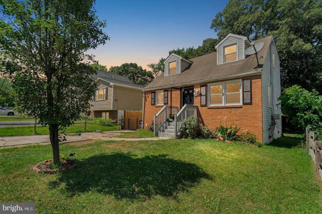 Welcome to this charming brick Cape Cod nestled on a spacious, fenced lot in Beltsville, Maryland. With easy access to I-95, Route 1, the ICC (MD-200), and the University of Maryland, this home offers the perfect blend of comfort and convenience.
The inviting main level boasts gleaming hardwood floors, recessed lighting, and an open living and dining area filled with natural light. The well-appointed kitchen features granite countertops, rich wood cabinetry, and stainless steel appliances. Two bedrooms and a full bath complete this level.
Upstairs, two additional bedrooms with hardwood floors and a full bath provide comfortable accommodations with the charming character of the home's Cape Cod dormers.
The fully finished walkout basement rounds out this impressive home with a bedroom, a versatile den, and a full bath — plus an in-unit washer and dryer for added convenience.
Step outside to a generous backyard with a covered pergola patio, perfect for relaxing or entertaining, along with private off-street parking.
This well-maintained home offers space, flexibility, and an unbeatable location. Don't miss it — schedule your showing today!