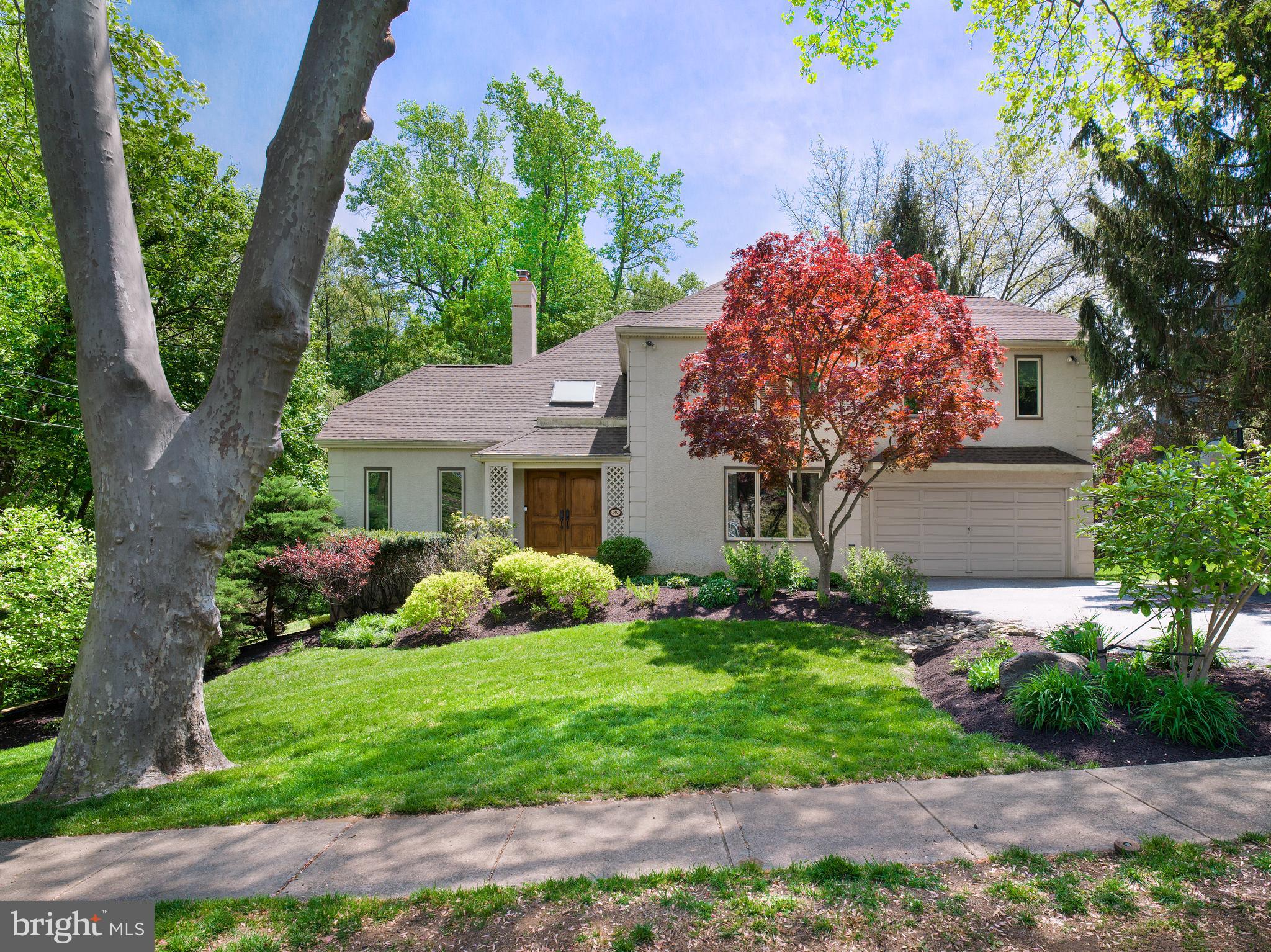 Move-in ready, perfectly sized home on a beautiful lot in a gem of a neighborhood—910 Bowman Avenue offers the best of lifestyle and location in the heart of Wynnewood’s beloved Shortridge/Indian Creek community.

Set on a quiet, low-traffic street with sidewalks and friendly neighbors, this 4-bedroom, 3.5-bath home offers a rare blend of comfort, walkability, and convenience. Enjoy easy access to Shortridge Park, Wynnewood Shopping Center, Whole Foods, Merion Elementary School, Suburban Square, and a quick commute to Center City.  Wynnewood, Merion, and Narberth train stations are all within a mile. Inside, a two-story foyer welcomes you with hardwood flooring, a double front door, and a striking Palladian window.  The living room’s vaulted ceiling and large windows enhance its sense of space and light, making it ideal for both everyday comfort and relaxed entertaining. Anchored by a fireplace and built-in cabinetry, the warm and welcoming family room opens through a glass door to a rear paver terrace—perfect for al fresco dining and entertaining. Adjacent is a vaulted-ceiling home office or bonus room, ideal for work, fitness, or relaxation, with built-in cabinetry and windows on two exposures.  The dining room includes crown and chair rail moldings, while the gourmet kitchen features a center island, stainless steel appliances, gas cooktop, and a bright breakfast area with lovely views. The first-floor spaces flow beautifully and can accommodate sizeable gatherings for entertaining, offering a seamless blend of openness and comfort. A main-level laundry room and powder room add everyday convenience.

Upstairs, the spacious primary suite includes a sitting area and a well-appointed bath with double vanity, whirlpool tub, and walk-in shower. Three additional bedrooms and a full hall bath complete the second floor.

The finished lower level adds flexible living space with a full bath—perfect for a media room, guest lounge, playroom, or home gym. A two-car garage, public utilities, and thoughtful upgrades—including a bonus room addition, paver patio, and newer roof, HVAC systems, and windows—complete the offering. Nestled beside a wooded area with peaceful views of the nearby creek, 910 Bowman Avenue is a beautifully maintained home in a close-knit, walkable neighborhood with top-rated Lower Merion schools and a lifestyle designed for modern living.
