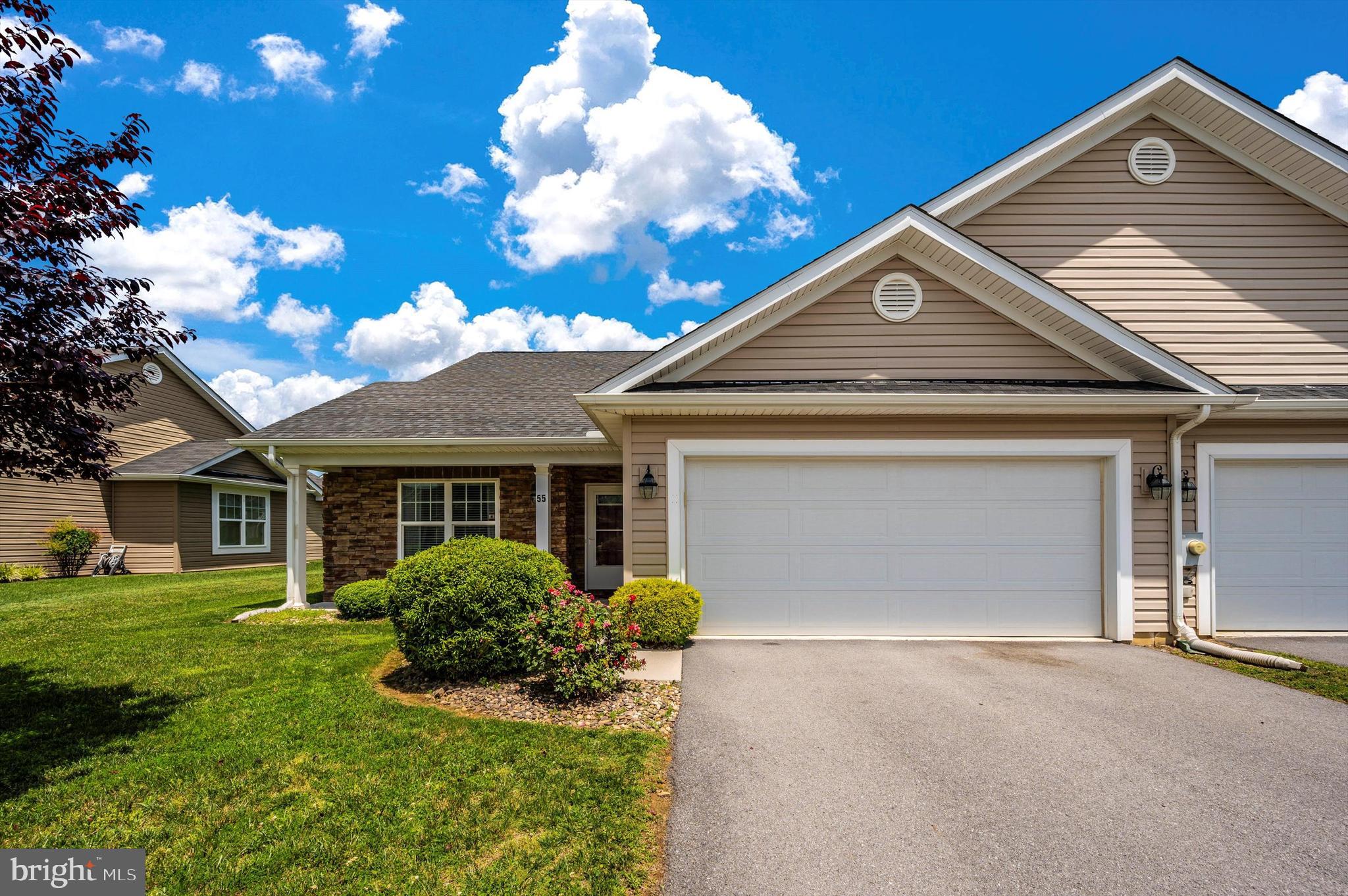 Welcome to 55 Cheval Place in the sought-after community of Spring Mills. This villa  boasts 1996 finished square feet with three bedrooms and three full baths!  The home has a very spacious and open floorplan. The first level features a living room, kitchen, dining area, the primary bedroom, a second bedroom and 2 full baths.   The  laundry area is also on the main level.  The upper level features the third large bedroom, oversized walk-in closet, and full bath. This home has a relaxing screened in back porch and an oversized garage. Spring Mills has many amenities including a community pool, tennis courts, basketball courts, and an extensive walking trail. Located just off I81, this home is perfect for commuters to WV, MD and VA!  Schedule your showing today!