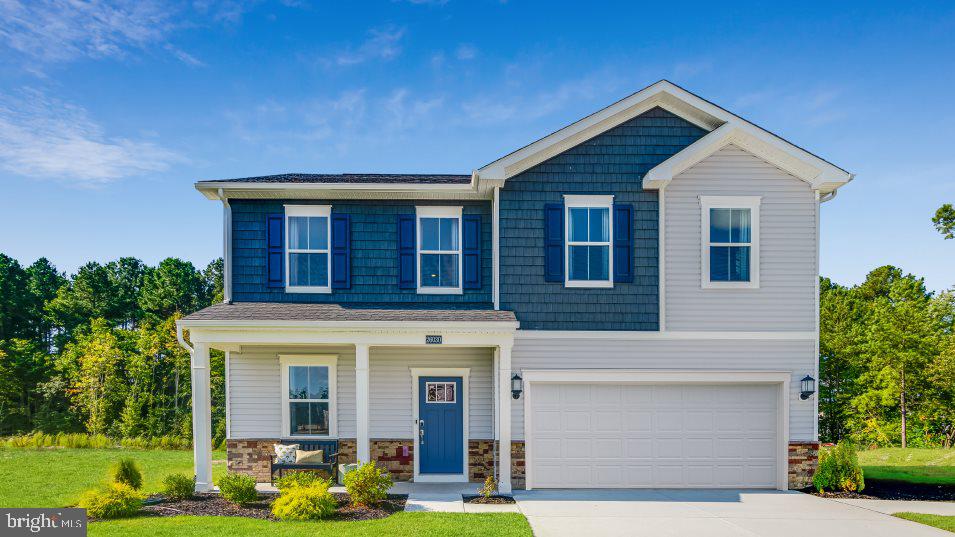 NEW CONSTRUCTION – ESTIMATED AUGUST 2026 DELIVERY! Welcome to the Richmond model Slab at Apple Harvest, a beautifully designed two-story home offering approximately 2,238 square feet of modern living space with a premium homesite backing to peaceful green space. This thoughtfully designed floor plan features 5 spacious bedrooms, 3 full baths, and a 2-car garage. The open-concept main level is ideal for everyday living and entertaining, seamlessly connecting the Great Room, dining area, and kitchen. The kitchen is appointed with Iced White Quartz countertops, Barnett Duraform cabinetry in Stone, stainless steel appliances, abundant cabinet space, and generous prep areas. A washer and dryer are included for added convenience. Upstairs, the private owner's suite offers a spacious retreat with an en-suite bath and walk-in closet, while three large additional bedrooms finish out the 2nd floor. Additional features include luxury vinyl plank flooring throughout the main living areas, smart home technology including a Ring Video Doorbell Pro and smart front door lock, ceiling fan pre-wiring, and designer-selected finishes throughout.

Apple Harvest is a master-planned community offering exceptional amenities including a swimming pool, pool house, tot lots, playgrounds, pocket parks, and open green spaces. Conveniently located just minutes from Route 45, I-81, and the Martinsburg MARC Station, residents enjoy easy commuting along with nearby shopping, dining, and entertainment at The Commons, North Mall, and Martinsburg Plaza. Outdoor recreation is close by at Ambrose Park, Poor House Farm Park, and Berkeley 2000 Recreation Center. Photos are of a similar home. Home features, finishes, colors, pricing, incentives, and availability are subject to change without notice. Closing costs and other buyer-paid fees are not included in the list price. School assignments are subject to change; buyers should verify current Berkeley County school attendance zones.