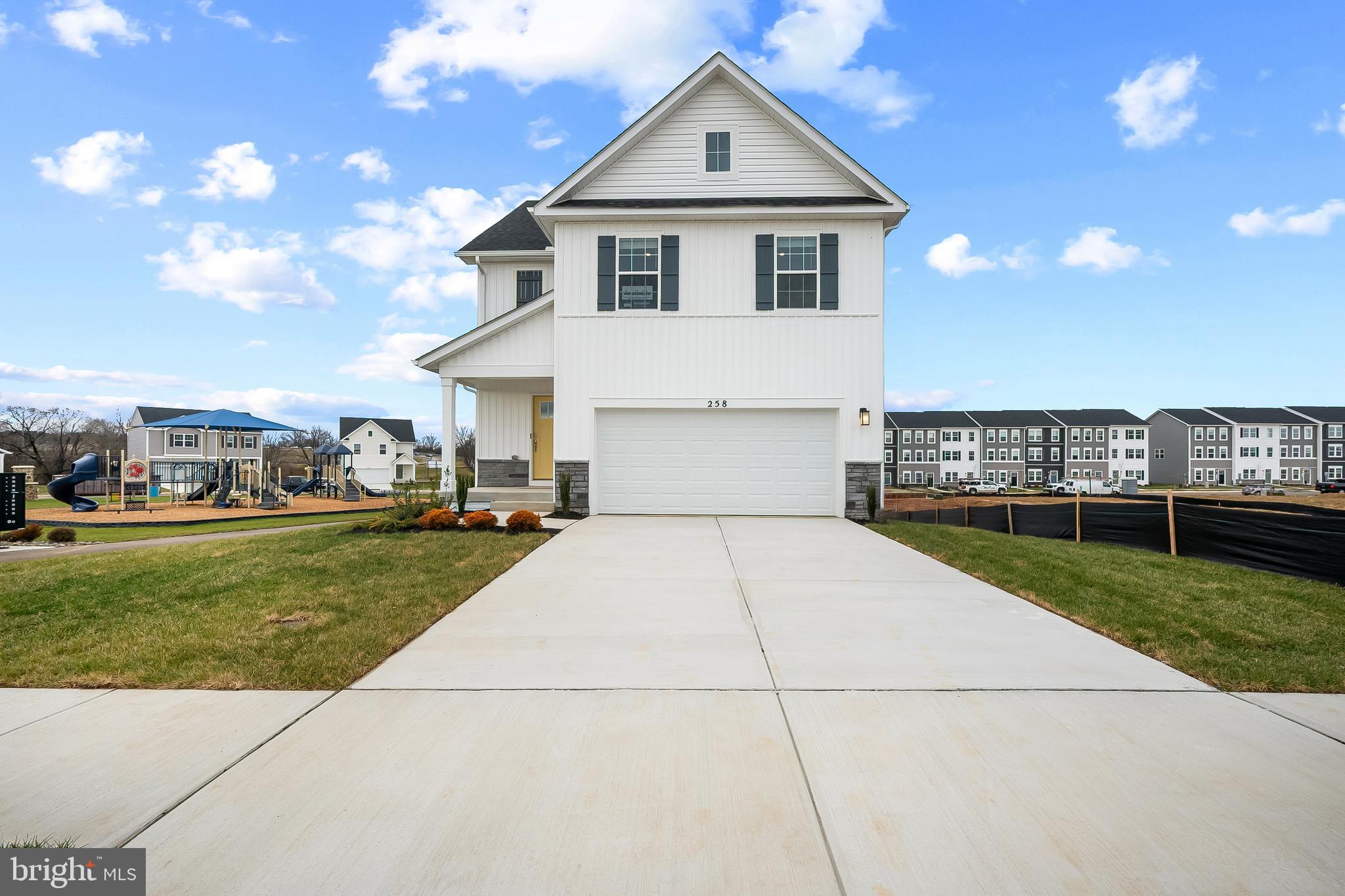 Welcome to Riverpointe, Charles Town’s newest community! This beautiful two-story Pine Colonial offers 1,953 sq. ft. of well-designed living space with 4 bedrooms, 2.5 baths, and a 2-car garage.
The open-concept main level features a spacious family room, and a modern kitchen complete with stainless steel appliances, quartz countertops, and a large eating area—perfect for everyday living and entertaining.
Upstairs, the primary suite is filled with natural light and includes a walk-in closet plus a private bath with dual vanity. Three additional bedrooms provide plenty of space for family and guests.
The lower level, walk-out basement is partially finished with carpet ready for those loving sports. Make this your theatre tv room.  There is also a rough-in for future bath and egress window.  

Enjoy a fully sodded yard, ready for outdoor fun, along with a prime commuter-friendly location just minutes from Northern Virginia, Maryland, and DC. Restaurants, shopping, and parks are all nearby for added convenience.
With its thoughtful layout, stylish finishes, and move-in ready appeal, this home is waiting for you. Schedule your tour today!   Features may vary. Delivery time is August.