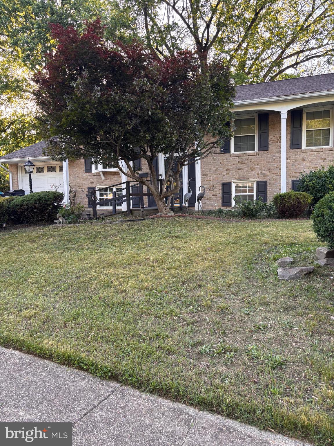Seller offering a $5000 credit and 1 year home warranty! Fantastic opportunity to own this well-maintained split foyer home featuring 4 bedrooms and 2 full baths in a highly desirable neighborhood! The bright upper level offers a spacious living room and an open dining and kitchen area with access to the rear deck—perfect for entertaining or relaxing while overlooking the fully fenced backyard. The finished lower level features a generous family room, a fourth bedroom, a full bath, a laundry/utility room, and walkout access to the backyard, providing flexible living space for guests, a home office, or recreation. Conveniently located near shopping, restaurants, schools, and everyday amenities, this home offers comfort, space, and an ideal location.