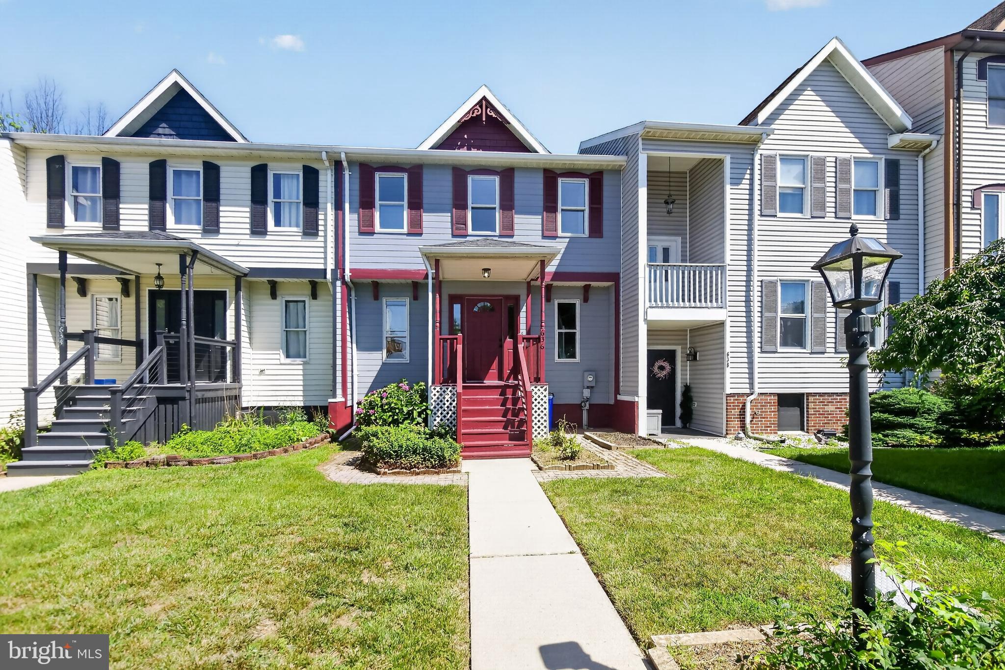 Beautifully remodeled Kenly Square townhome! This move-in-ready home offers an open main level with a spacious living room, dining area with access to the rear deck, a brand new kitchen featuring 42" cabinets, granite counter tops, new stainless steel appliances, and a convenient half bath. Upstairs you'll find two spacious bedrooms, both with step in closets, and a fully renovated bath with custom tile shower surround. The partially finished step-out basement provides flexible space for a great room, home office, gym or possible third bedroom. Enjoy the rear patio and yard for outdoor living. Recent updates include fresh interior and exterior paint, Luxury vinyl plank flooring, new carpet, modern lighting, and more.. Major improvements in recent years include the roof, Trane gas furnace, central A/C, and water heater for added peace of mind. Available, move-in ready.
