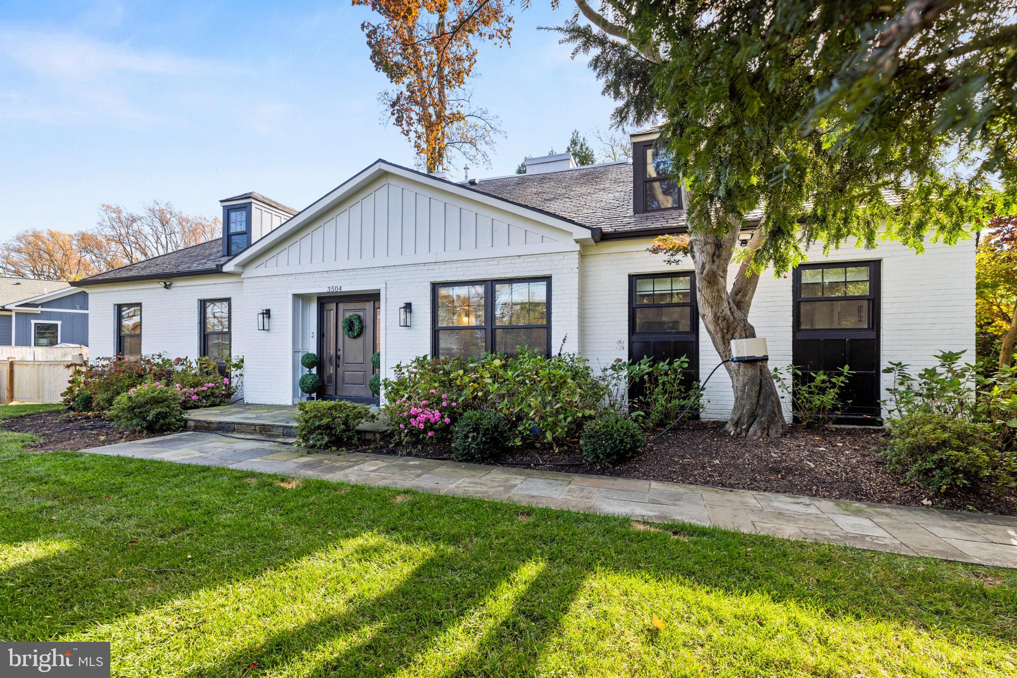 Turn-Key Stunner in Chevy Chase with a SUPER DESIRABLE LAYOUT featuring an opportunity for Main Level Living with everything you need on one level including the Primary Suite! Don’t let the East West address fool you—this property sits back from the road, offering lush, mature landscaping, a private fenced backyard, and two-car garage parking accessible via an off-road alley. This beautifully renovated 4-bedroom, 4.5-bath home is a true gem, blending modern luxury with timeless design. Flooded with natural light and showcasing high-end finishes throughout, this expansive residence is perfect for both relaxing and entertaining. Oversized, energy-efficient Andersen windows, JELD-WEN interior doors, a fiberglass front door, and an Andersen sliding glass patio door ensure quality and style. Recessed LED lighting highlights the gleaming engineered hardwood floors that run throughout the home. At the heart of the home is the chef’s kitchen, featuring a stunning quartz wrap-around island, fingerprint-resistant black stainless steel appliances, and top-of-the-line energy-efficient appliances—ideal for both everyday living and gourmet entertaining. The main level primary suite is a private oasis, complete with a walk-in closet, LED mirror, freestanding bathtub, elegant marble and porcelain tiles, a double modern vanity, and a shower panel with body spray. Upstairs, 3 additional spacious suites, each bathed in natural light, offer large walk-in closets and en-suite bathrooms, plus a convenient upstairs laundry room with tons of storage. Meticulously maintained, this home boasts numerous upgrades, including a new Carrier Infinity 19 SEER 5 Ton HVAC system, maintenance-free PVC fascia, brick walls, a natural stone slate roof, a 6” gutter system with covers, and a whole-house water filtration system for cleaner, healthier water. The welcoming back patio and lush lawn, along with a flagstone front stoop and walkway, enhance the home’s curb appeal. Recent updates include the installation of a whole-house water filter, a new garage door, additional tree plantings along East West Hwy and between neighboring properties, an outdoor fence, and a thorough HVAC energy audit for optimal efficiency. The property also features a back-up generator, gas fireplace, and new blinds. Beyond the home’s interior, the location is unbeatable. Nestled between the vibrant communities of Bethesda and Chevy Chase, you’ll enjoy the best of both worlds. Explore the charming streets of Chevy Chase, where local shops and parks create a quaint neighborhood feel, or head to Bethesda, just minutes away, for endless dining, shopping, and entertainment options like Bethesda Row, Woodmont Grill, and cultural hubs such as the Bethesda Jazz & Blues Club. You’re also just blocks from the DC line, Friendship Heights, and Columbia Country Club. With easy access to the upcoming Purple Line, Metro, downtown DC, and major thoroughfares, commuting and weekend adventures are a breeze. Move-in ready and whisper-quiet inside, this is the home you’ve been waiting for. Don’t miss out!