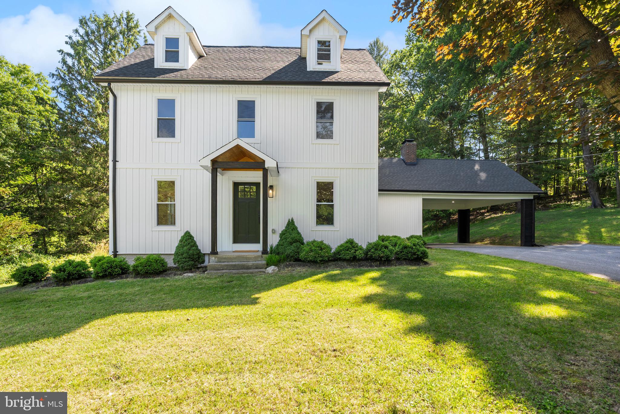 Set on a scenic hilltop in the sought-after Hereford Zone, this fully renovated farmhouse blends timeless character with high-end modern updates. Originally built in 1904 and completely transformed in 2022, the home offers four finished levels, hardwood floors, solid wood doors, designer lighting, and thoughtfully selected finishes throughout. The kitchen was designed with both everyday living and entertaining in mind, featuring upscale appliances, abundant workspace, and a seamless flow into the main living areas. Upstairs, the home features 3 bedrooms, highlighted by an impressive primary suite that serves as a true retreat with a walk-in closet, loft area, and a luxurious ensuite bath featuring a freestanding soaking tub, oversized dual-head shower, and high-end finishes throughout. Two additional generously sized bedrooms and a beautifully finished full bath complete the upper level. Outside, the spacious level backyard offers plenty of room for gatherings, play, or simply enjoying the peaceful setting. The finished lower level offers exterior access and additional flexible living space. Tucked along a quiet country road, the property feels private and serene while still being less than 10 minutes from I-83 and just moments from the NCR Trail, outdoor recreation, and fishing. The extensive 2022 renovation included major system upgrades such as the septic, well, plumbing, electrical, dual-zone HVAC, roof, siding, gutters, driveway, landscaping, and more — offering the feel of new construction with the character and craftsmanship rarely found in newer homes. Move-in ready and beautifully updated from top to bottom, this home is anything but ordinary.