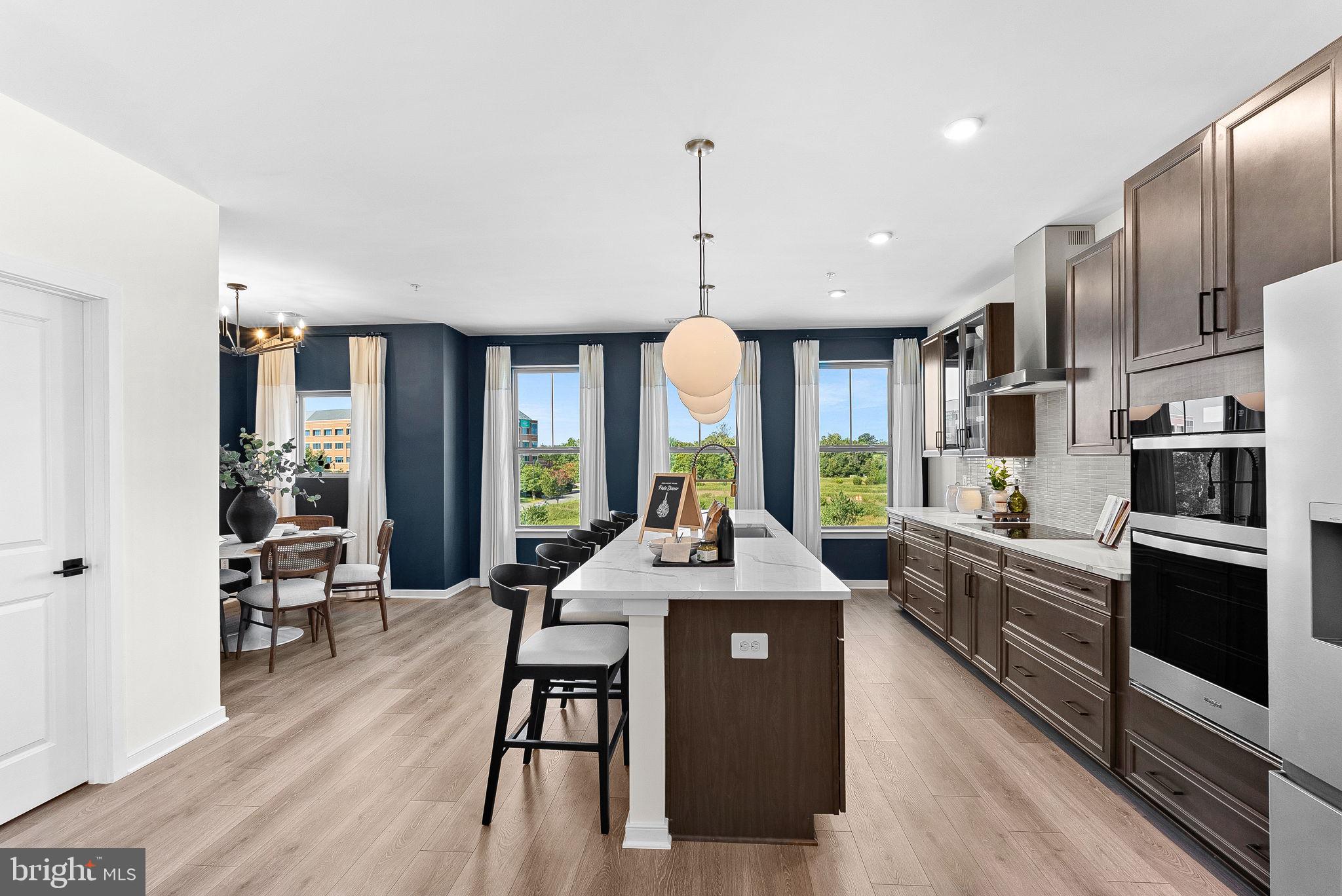 NEW CONSTRUCTION. BASE LISTING. Brand-new, upscale 1 car garage 2-level home available for immediate – summer move-in. Welcome to the Hepburn, a brand- new, upscale stacked townhome in the sought-after Belmont Park community in Ashburn, VA. This 2-level home with a 1-car garage is designed for convenience and style—perfect for those ready to move quickly! Featuring 3 bedrooms and 2.5 baths, this home boasts a modern kitchen with 42” cabinets, LED lighting, quartz countertops, and stainless-steel Whirlpool appliances. A generous kitchen island and covered deck invite connection. The spacious primary suite includes a generous walk-in closet and a luxury bathroom with raised double vanities and a walk-in spa shower. Plus, the garage comes equipped with an EV charger-compatible outlet for future-ready living. Enjoy low- maintenance living with snow removal, lawn care, and exterior upkeep all handled for you—giving you more time to enjoy life, not maintain it. Receive $25K in Closing Costs until 6/30 with a Choice Lender. See New Home Counselor for details. Hometown heroes get $2,500 (restrictions apply; see New Home Counselor for details). Belmont Park offers resort-style amenities including bocce ball, volleyball, playgrounds, community greenspace, and more. These homes are DOE Zero Energy Ready Homes™, built for efficiency and comfort. Located in Ashburn, you’ll have quick access to major roadways, Dulles Airport, and endless dining and entertainment. Beazer Homes at Belmont Park are designed to live better day to day, with energy efficient construction that lowers monthly utility costs, thoughtful design options that make personalization simple, and Mortgage Choice, where our top lenders help you compare options and save money on your home loan. This high-performance home is built to lower your total cost of homeownership through reduced utility bills, durable materials, and high-quality construction that minimizes long-term maintenance costs. Beazer Homes is proud to be America’s #1 Energy Efficient homebuilder. Our FY25 average gross HERS score of 32 (38 excluding solar) was the lowest of the publicly reported scores among the top 30 U.S. homebuilders by volume identified by Builder Magazine’s Top 100 List (based on 2025 total closings). Get protection against rising energy costs without changing how you live. Every Beazer home is pre-wired for solar, making it easier and more affordable to add a renewable system when you are ready. Model Home Hours: Mon–Sun, 11 AM–6 PM. Use 19758 Misty Moss Square Ashburn, VA 20147 for GPS directions. Parking will be next to our Information Center trailer. Please go to the model home listed here first.
