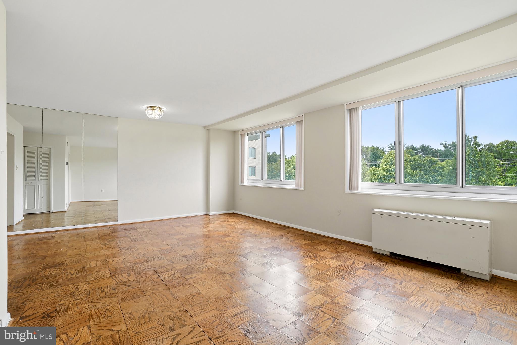 Price Improved! Welcome to 10500 Rockville Pike Unit 605! Located in the sought-after Grosvenor Park building, this spacious studio-style unit offers approximately 560 square feet of living space with sweeping views of the cityscape and lush 20-acre grounds.

Welcoming entry with expansive closet space for storage and classic refinished parquet wood flooring throughout. The open concept living area is bright with wall-to-wall dual-pane insulated and soundproof windows letting in an abundance of natural light. Recent updates include a replaced HVAC convector, installed Bali vertical blinds, fresh paint, updated interior doors, and new bath enclosure doors and hardware.

The kitchen features ample cabinetry with updated countertops, cooktop, sink, garbage disposal, dishwasher, stainless-steel gas range, oven, and durable tile flooring. The walk-in closet features dual-sided racks and shelving for optimal organization and storage. The closet leads to the full bath with crisp tilework, tub/shower combo with glass door entry, updated vanity, and refreshed hardware.

All utilities including cable and internet are included in the condo fee. Community amenities include Concierge and security services, Swimming Pool, Fitness Center, Laundry Facilities, Tennis Courts, Walking Paths, Playground, Grocery Store, and Lake access.

Commuter’s dream location with a private underpass providing a short walk directly to the Grosvenor Metro Red Line station—just minutes to NIH, Walter Reed, Downtown Bethesda, and Downtown Washington, DC. Convenient access to I-495 and I-270 makes getting anywhere in the DMV a breeze!

Schedule your showing today!