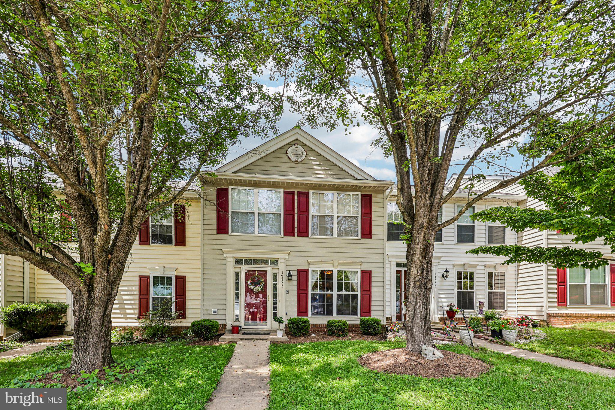 Welcome to this charming townhome nestled beneath mature shade trees in an established community, where inviting curb appeal and comfortable living come together. A welcoming front entry opens to a spacious main level filled with natural light, featuring durable luxury vinyl plank flooring that flows throughout the living and dining areas. The generous living room offers an inviting space to relax or entertain, while the adjoining dining area creates an effortless flow for everyday living.
 
The kitchen is both functional and spacious, offering abundant oak cabinetry, granite countertops, ceramic tile flooring, a pantry, and a center island that provides additional workspace and casual gathering space. Sliding glass doors lead from the breakfast area to the fenced in private yard creating an ideal setting for outdoor dining, morning coffee, or entertaining friends and family.

Upstairs, you'll find three comfortable bedrooms, all featuring luxury vinyl plank flooring upstairs and hardwood on the main level for style and easy maintenance. The updated full bathroom has been thoughtfully renovated with a granite-topped vanity, modern lighting, and an accessible walk-in shower with grab bars, blending comfort with convenience.

Throughout the home, large windows provide an abundance of natural light, while neutral finishes and spacious rooms create a warm and welcoming atmosphere. Mature trees surrounding the property offer shade and privacy, enhancing the peaceful outdoor setting.

Roof replaced in 2021.

Conveniently located near shopping, restaurants, parks, schools, and major commuter routes, this home offers the perfect combination of comfort, practicality, and an exceptional location.