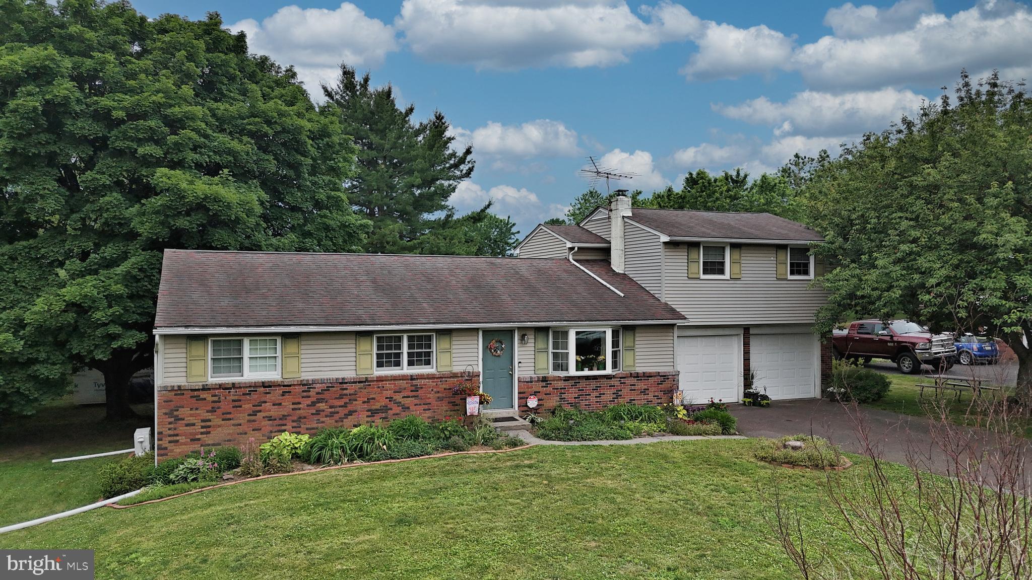More photos coming today! Enjoy peaceful country views without sacrificing convenience in this spacious 5-bedroom, 2-bath home situated on just over a half-acre in Perkasie. With farmland stretching behind the property and across the street, you'll appreciate the scenic setting and sense of privacy every day.

The heart of the home is the large eat-in kitchen, which flows seamlessly into the living room, creating an open and inviting space for everyday living and entertaining. Sliding glass doors lead to the rear sunroom, offering the perfect spot to relax while overlooking the backyard and surrounding countryside.

The main level features three generously sized bedrooms and a full bath, while the upper level offers two additional bedrooms and a second full bath, providing exceptional flexibility for home offices, guest rooms, hobbies, or multi-generational living.

Outside, the spacious yard offers plenty of room for outdoor activities, gardening, or entertaining, and the attached two-car garage provides added convenience and storage.

If you've been searching for a home that combines space, functionality, and a beautiful rural setting just minutes from local amenities, this property is one you won't want to miss.