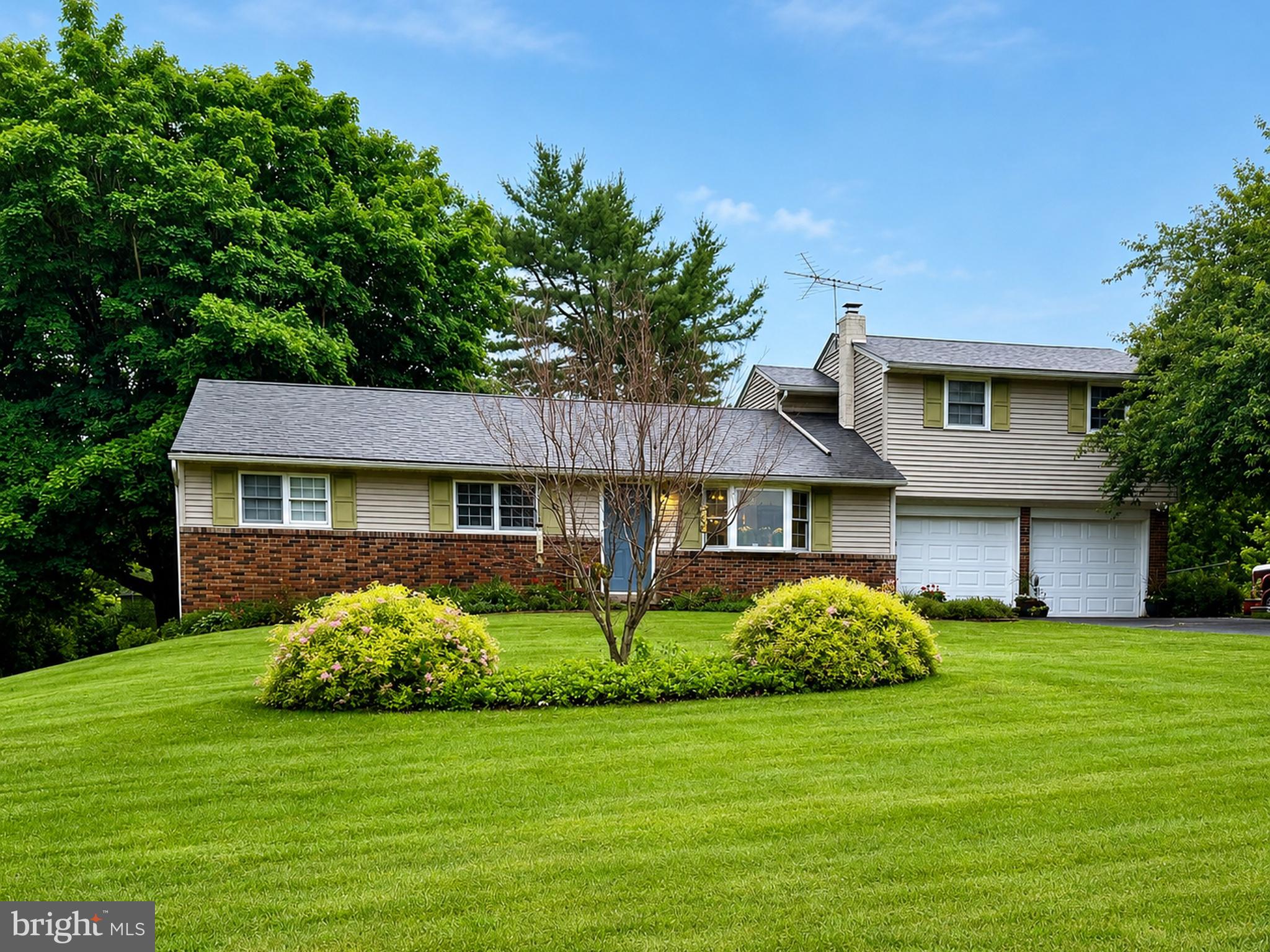 Enjoy peaceful country views without sacrificing convenience in this spacious 5-bedroom, 2-bath home situated on just over a half-acre in Perkasie. With farmland stretching behind the property and across the street, you'll appreciate the scenic setting and sense of privacy every day.

The heart of the home is the large eat-in kitchen, which flows seamlessly into the living room, creating an open and inviting space for everyday living and entertaining. Sliding glass doors lead to the rear sunroom, offering the perfect spot to relax while overlooking the backyard and surrounding countryside.

The main level features three generously sized bedrooms and a full bath, while the upper level offers two additional bedrooms and a second full bath, providing exceptional flexibility for home offices, guest rooms, hobbies, or multi-generational living.

Outside, the spacious yard offers plenty of room for outdoor activities, gardening, or entertaining, and the attached two-car garage provides added convenience and storage.

If you've been searching for a home that combines space, functionality, and a beautiful rural setting just minutes from local amenities, this property is one you won't want to miss.