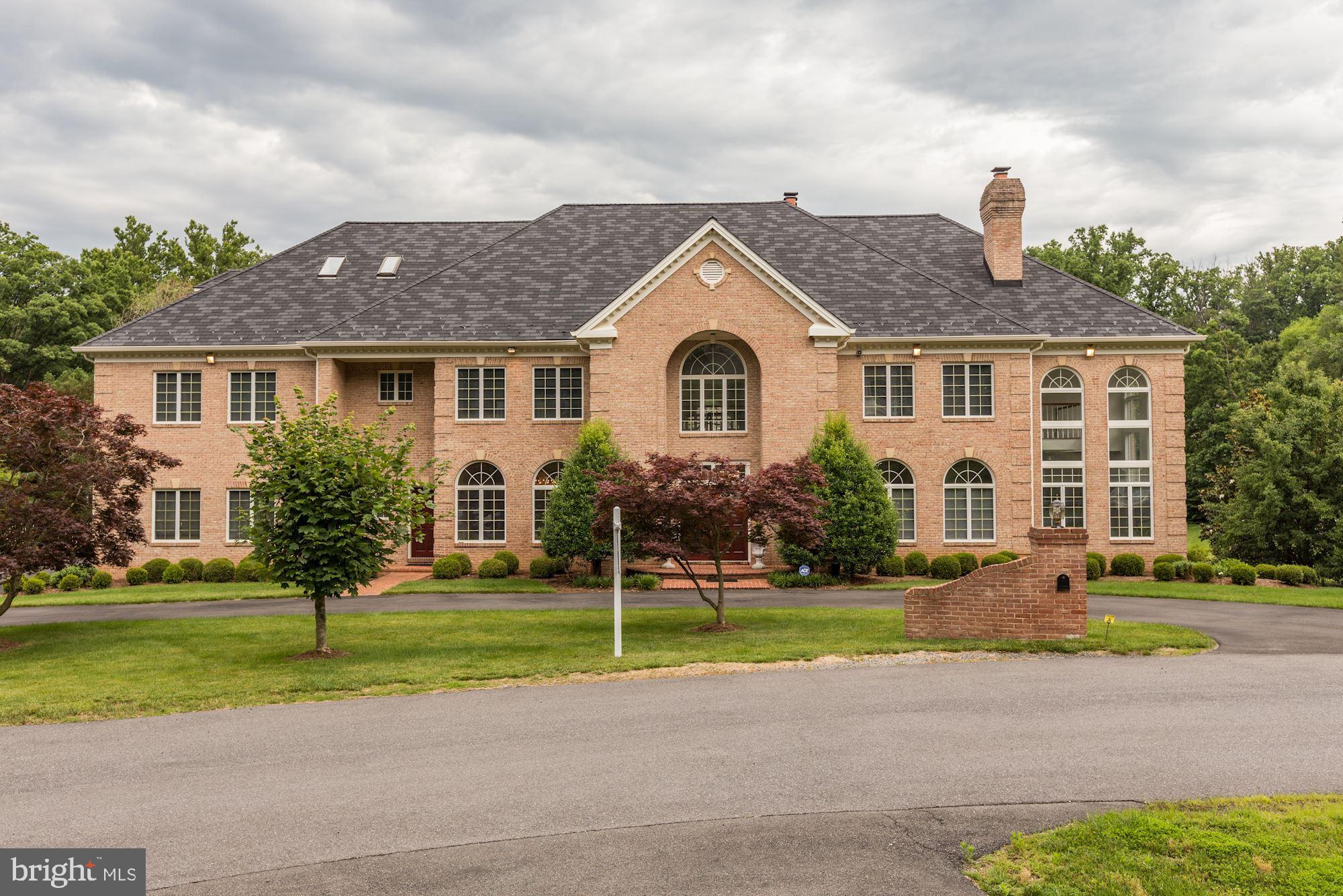 Location, location, location and a perfect lot, level in the front and huge level rear yard out of the walk-out basement. This all-brick estate with circular driveway to desirable door entryway. The home features a 3-car side loading garage and is built to today's standards with 10 ft ceilings. As you enter the grand foyer, the embassy sized dining room with plaster molding is on your left. The formal living room on the right along with a stately paneled library. At the back of the home, you find the grand 2-story family room with custom marble fireplace, all open to the kitchen and breakfast room. The kitchen features a subzero refrigerator, gas cook tops. The 2nd floor has 5 bedrooms all with their own baths, all baths have been updated. There is a 4th floor great for a huge kids' playroom or upper lounge. The luxurious master suite with spacious master bath rebuilt in 2021 with up-to-date style. The lower level is perfect for entertaining with full bar and wine room and is a walkout onto the perfectly flat rear yard. $150.00 application fee as well as a $100.00 credit check fee for every person over the age of 18. Tenant will pay an additional $400 per month for landscaping, irrigation, security, and internet.