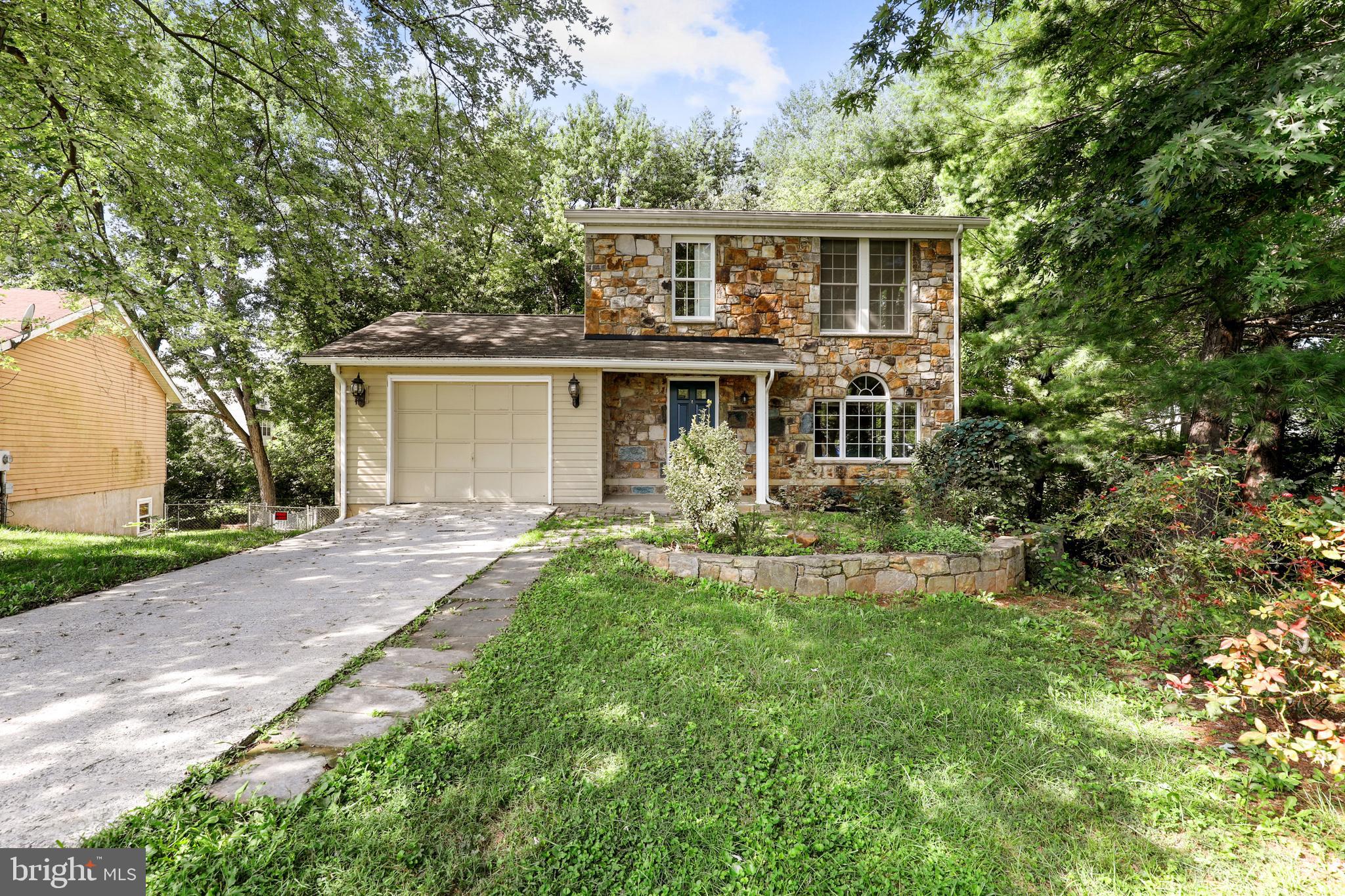 Beautiful 3BR, 2.5 bathroom home in the heart of Stonegate Farms neighborhood!  Newly hardscaped, with a spectacular wooded view and fenced in yard. The backyard includes a brand new outdoor fire pit and the home has been freshly painted throughout! Equipped with a spacious primary bedroom with connecting full bathroom, and 2 more generous sized bedrooms, with an additional full bathroom in the upstairs hallway. The walk out basement includes a wet/dry bar and PLENTY of storage space. The kitchen allows access to the newly painted deck, making a tranquil place for friends and family to gather. Priced to sell!