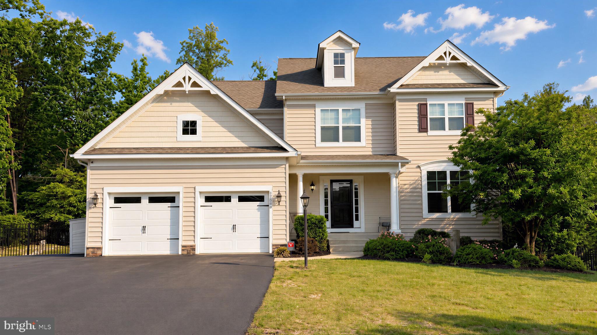 Is there a 5-bed single family home in California MD near PAX River with modern finishes, outdoor space, and immediate occupancy? Welcome to 45480 Havenridge St in The Woods at Myrtle Point, offering 4,378 sqft, a finished walkout basement, and a prime location just minutes from PAX Naval Air Station and Myrtle Point Park.
This 5-bed single family home in California MD, built in 2016, blends space, function, and comfort across three finished levels. The main level features gleaming hardwood floors, 9 foot ceilings, and a custom stone gas fireplace that creates a warm, inviting focal point. The kitchen is designed for gathering with a massive center island, abundant cabinetry, upgraded granite countertops, stainless steel appliances, and a pantry that supports everyday living and entertaining.
Upstairs, you will find four spacious bedrooms along with a convenient second-floor laundry room that simplifies daily routines. The finished walkout basement expands the living space with a large rec room, wet bar, full bath, and a fifth bedroom. An additional laundry hookup adds flexibility for guests or multi-generational living.
Outdoor living stands out with a 10x17 screened porch, a large concrete patio with a hot tub, and a fully fenced backyard that backs to wooded privacy. A gas hookup is ready for outdoor grilling, making this space ideal for relaxing or hosting.
Modern systems include energy efficient gas heat, a tankless gas water heater, and durable architectural shingles. Residents of The Woods at Myrtle Point enjoy access to a pool, clubhouse, sidewalks, and street lights, with optional daycare services available. Myrtle Point Park is within walking distance, offering scenic trails and beach access.  Conveniently located near PAX Naval Air Station, this home delivers both lifestyle and location.