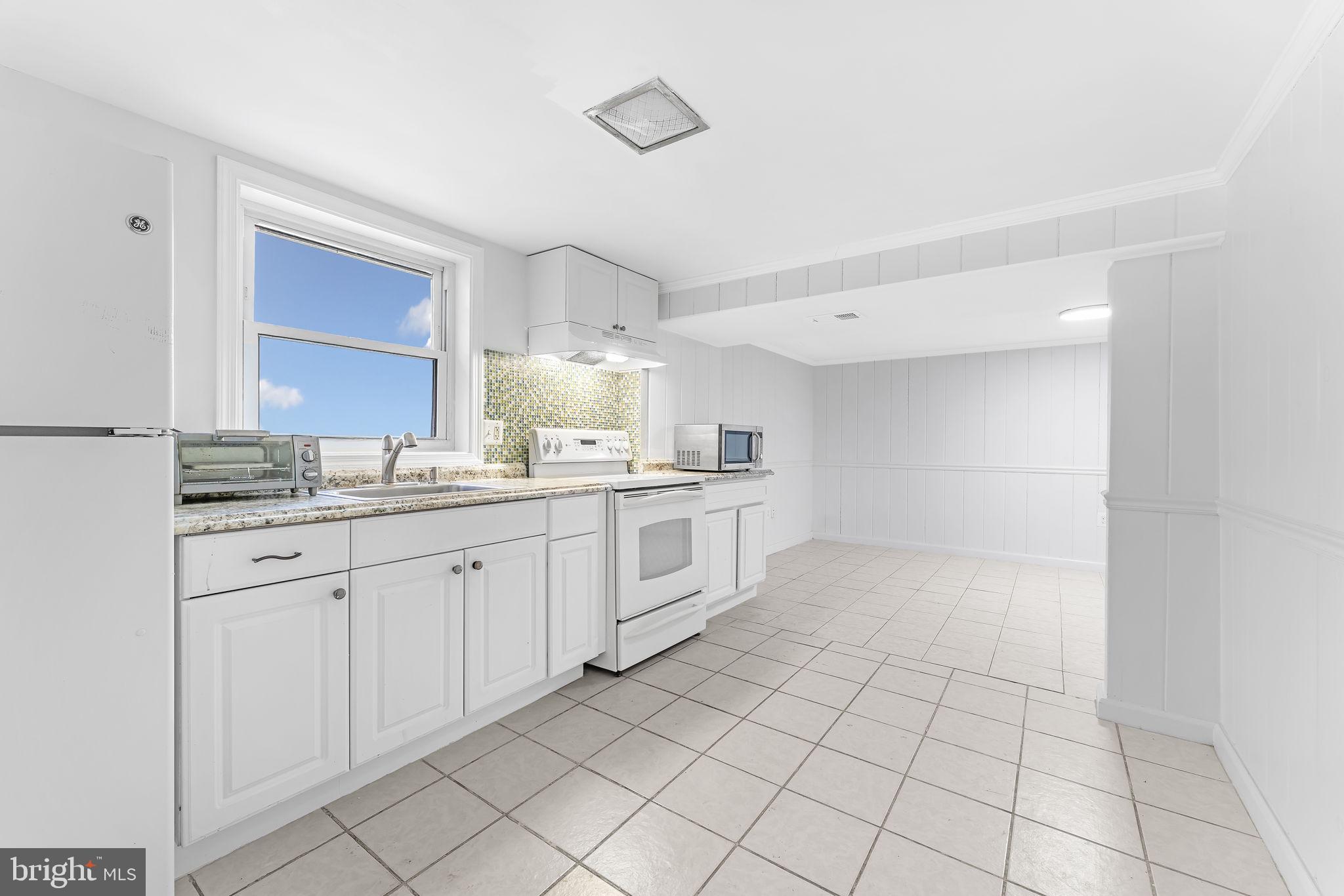 Spacious, sunny and upgraded 2 bedroom, 1 full bath, 1 level unfurnished pet-friendly, lower level apartment inside a single family home near Seven Corners shops, restaurants, grocery stores and all forms of transportation. Ceramic tile floors, central air conditioning, gas heat, and recessed lighting throughout unit. Kitchen includes stove, refrigerator, disposal and plenty of counter and cabinet space. Spacious bathroom with pedestal sink, medicine chest and bathtub-shower combination
Cats and dogs allowed (breed restrictions apply).  Additional $500 refundable security deposit per pet.
Fabulous large fenced yard that has many uses (Landlord pays for all lawn care as part of rent).$45/adult application fee; 1st month's rent, pro-rata rent (if any), 1 month house and/or pet security deposit paid prior to move-in.  No smoking inside apartment. Tenant pays 1/3 of the gas and electric bill and 1/2 of the water, sewer and trash bills. Minimum lease term 12 months; maximum lease 5 years.  Available March 27,2025.