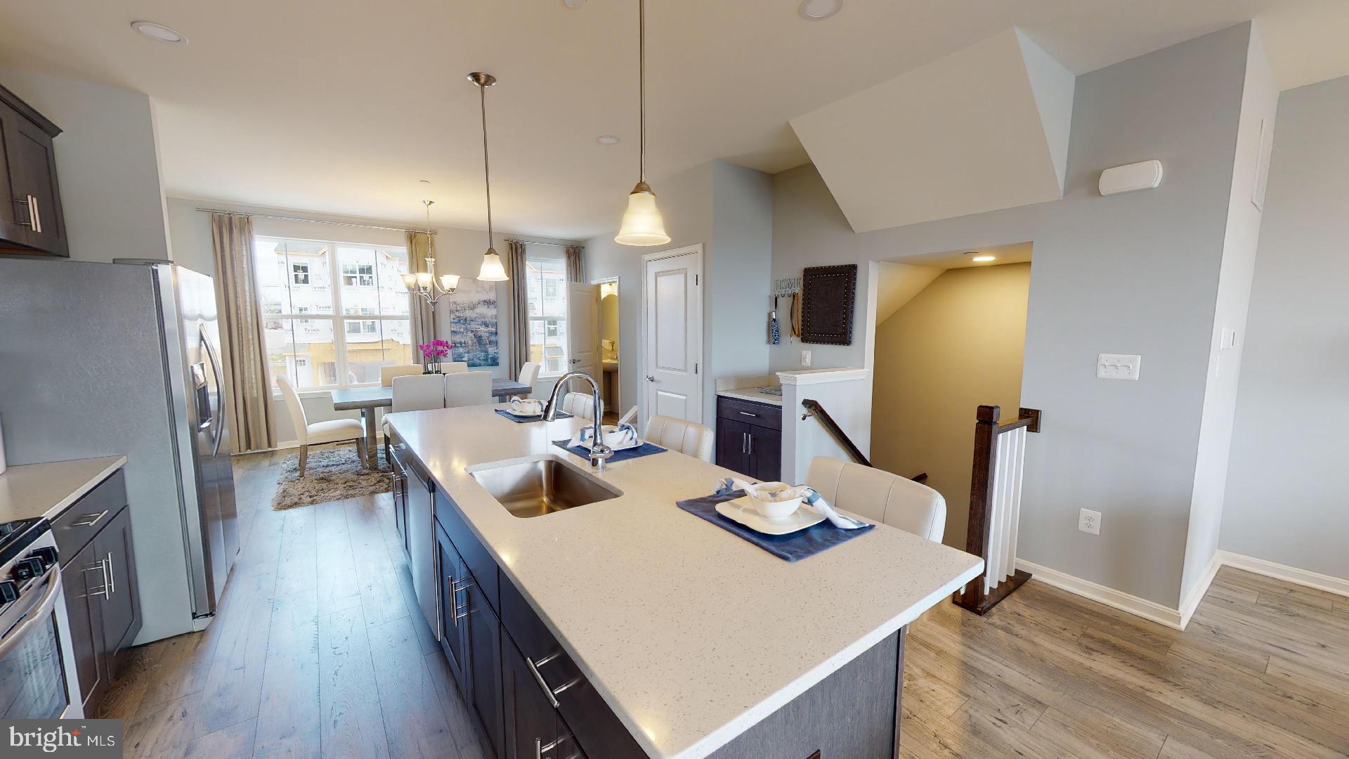 LAST BUILDING IN THIS FAST SELLING NEIGHBORHOOD - ALL CLOSING PAID W/ PREFERRED LENDER AND TITLE COM. 

 SELLING  OFF-SITE at our Sales Center and model located in our Vista Reserve Community located at 5941 Monk Ave, White Marsh.   

The Craftsman elevation immediately stands out with its striking color palette and rich stone accents, creating exceptional curb appeal. 
Inside, this impressive floor plan includes three bedrooms and three-and-a-half baths, providing comfort and convenience for any lifestyle. The main living level is bright, open, and perfect for gathering. The enormous kitchen island offers ample prep and seating space, while the oversized great room—creates the perfect setting for relaxing or entertaining. 
 A separate dining area ensures seamless hosting for family and friends.

Upstairs, you’ll find three spacious bedrooms, including an owner’s suite with a private bath and a second full bath for guests. The bedroom-level laundry adds a level of convenience rarely found in townhome living.

The finished lower level expands your living options with a rec room and an additional full bath. 

The Abigail truly offers something for everyone.

THERE IS STILL TIME TO PICK YOUR FINISHES.  PRICE INCLUDES PREDETERMINED STRUCTURAL OPTIONS AND INCLUDED FINISHES. 

Homesite #181  346 Aqua Square  Edgewood, MD

Selling Off-Site at our Vista Reserve Location:  5941 Monk Ave, White Marsh, MD