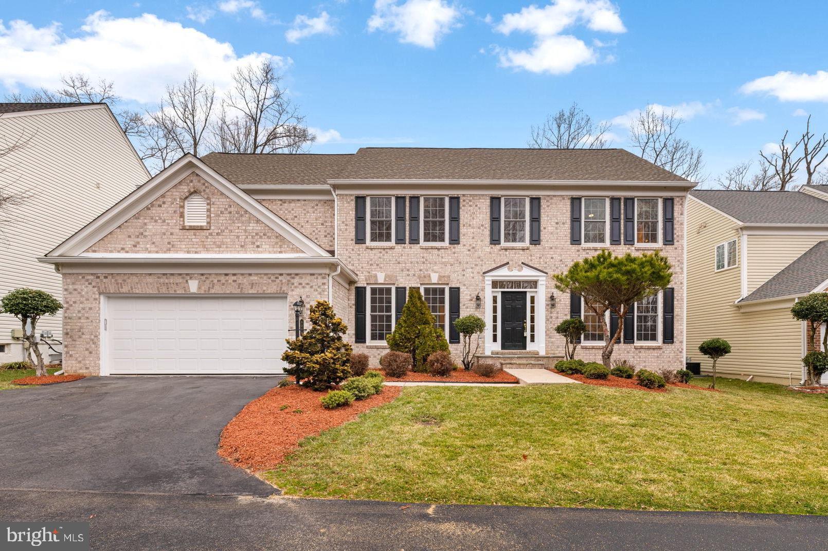 Welcome to this stunning, sun-drenched home featuring a dramatic two-story foyer. The chef’s kitchen is a culinary delight, complete with a spacious island with a breakfast bar, built-in desk, gas cooktop, double ovens, and a pantry. 

The luxurious primary suite boasts elegant tray ceilings, an abundance of natural light, a private sitting area, and a generous walk-in closet. The spa-like primary bath features double sinks, a separate vanity area, and a separate shower.

Nestled on a premium lot backing to scenic parkland and the cross county trail, this home offers a peaceful retreat with a spacious Trex composite deck perfect for entertaining.

An unfinished walkout basement presents endless opportunities for expansion, whether for additional living space, a home gym, or a recreation area. The main-level library is ideal for a home office or study space, offering both convenience and versatility. Additional special features include:  most of house freshly painted 2025, second staircase off the family room, new roof 2017, new dual zone HVAC with 2 gas furnaces and 2 A/C 2019, new water heater 2019, new garage door and new opener 2023, new engineered hardwood floors 2023, many new windows, sprinkler system,  gas generator with automatic transfer switch, loaded with recessed lights, crown molding, chair rail and wainscotting and more.                         
Laurel Hill is conveniently located within walking distance to schools, shopping and restaurants.  Laurel Hill Golf Club is  less than a 5 minute drive.  The community offers many amenities to include tot lots and swimming pool. It also offers easy access to the train, metro, I95, Fort Belvoir, Quantico and the Pentagon.

 Don’t miss this exceptional home in a prime location!