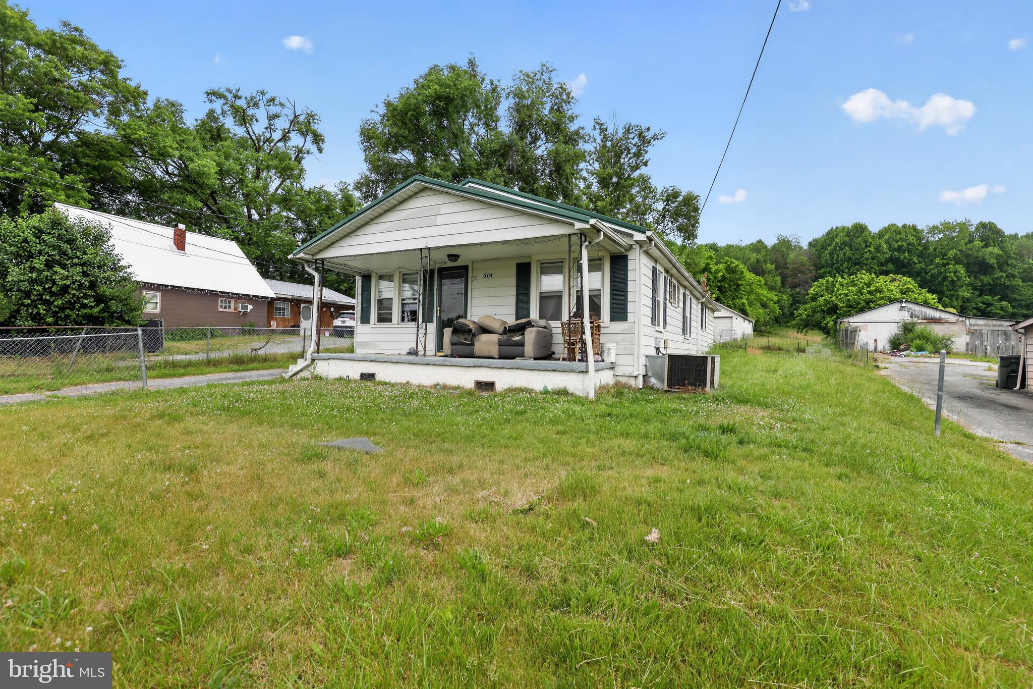 Welcome to 604 Shakesville Rd in Bristol, VA — a spacious property full of opportunity, character, and value! This home offers generous living space with an open-concept layout, large rooms, and plenty of natural light throughout. Featuring updated flooring in several areas, a large kitchen with ample cabinet space, and multiple flexible living areas, this property is ideal for a homeowner looking to personalize a space or an investor seeking strong potential.

The home offers roomy bedrooms, expansive common areas, and a unique rustic-style living room accent wall that adds warmth and charm. Outside, enjoy a level yard with room for entertaining, pets, gardening, or future improvements. Conveniently located near shopping, dining, schools, and major roadways, this property combines affordability with endless possibilities.

Whether you're searching for a primary residence, rental investment, or fixer-upper with upside potential, 604 Shakesville Rd is packed with opportunity and priced to move. Schedule your showing today and imagine the possibilities!