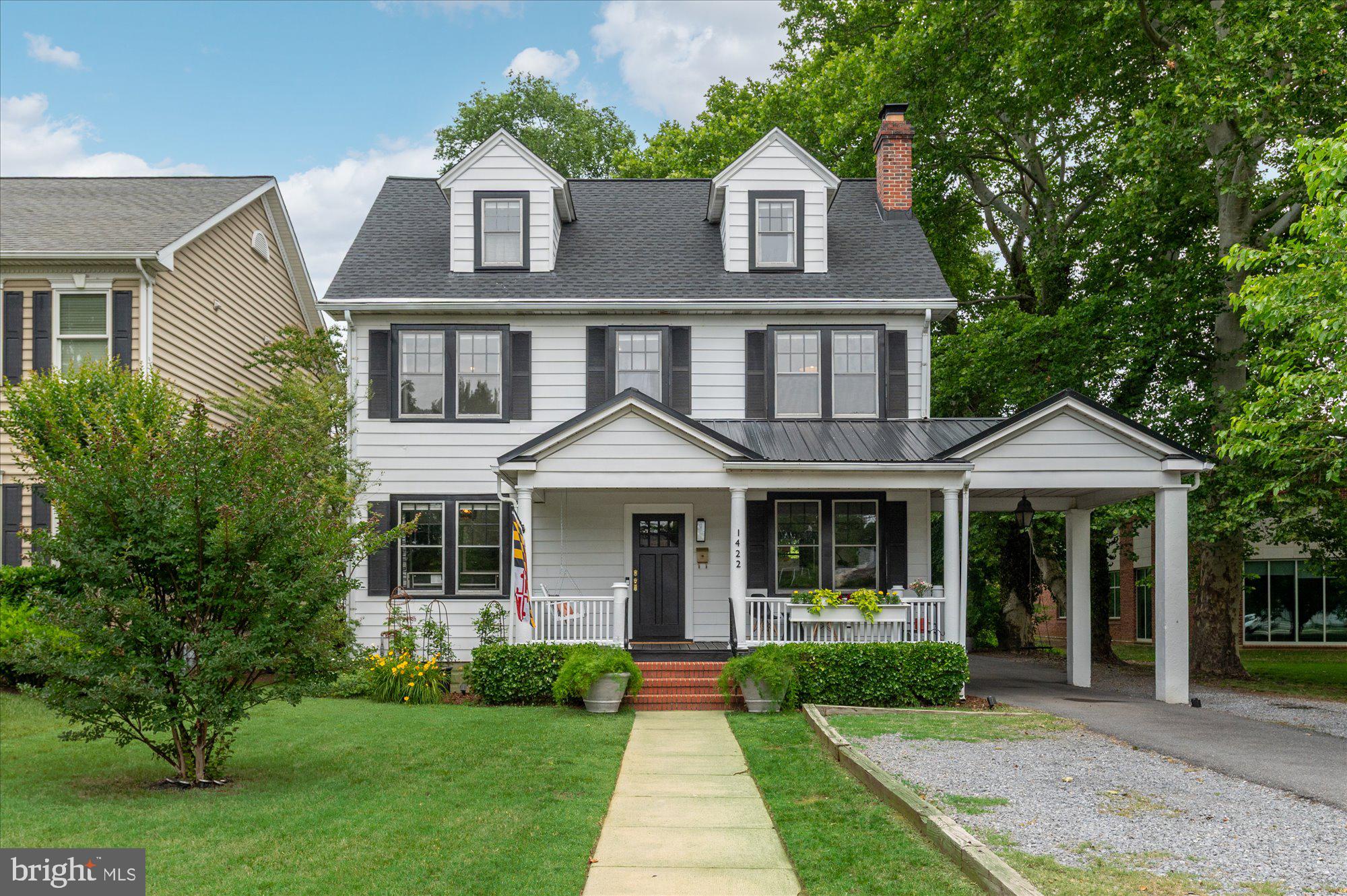 One of Homewood’s most distinctive homes, this 8-bedroom, 4-bath residence offers over 3,100 square feet and a truly unique story. Once known as the “Gables Tourist Home” Bed & Breakfast, the property (built in 1938) still carries subtle nods to its past—including the numbered bedroom doors—while the current owners have thoughtfully updated the interiors and major systems for comfortable modern living.

Inside, the home blends historic character with fresh, eclectic design—full of personality, flexibility, and space to live, work, and host. With eight bedrooms, the layout offers exceptional versatility for multi-generational living, guest suites, or creative uses. The fully renovated walkout basement (2021–2022) adds significant finished living space and includes a kitchenette and full bath—ideal for guests, recreation, or extended living arrangements. Recent improvements include basement waterproofing, new HVAC, boiler, water heater, roof, and the addition of a natural gas line—offering peace of mind alongside style and character.

Out front, a classic covered porch and carport embrace true “porch life”—a welcoming spot to relax, gather, and enjoy the neighborhood (and a top notch, very sweet lemonade stand location). 

The location is equally compelling. Set in the heart of the Homewood neighborhood, the home sits next door to the beautiful Busch Library and is a stone’s throw to the Poplar Trail. Enjoy easy access to neighborhood favorites including Ceremony Coffee, Black Market Bakers, and Carlson’s Donuts, along with the convenience of downtown Annapolis, West Street shops, and commuter routes just minutes away. With parking for approximately 8+ cars, the property offers exceptional flexibility and convenience and a great spot to gather before Navy / Blues games. There is no HOA/Dues but residents are eligible to join the Admiral Heights pool.

This is a rare opportunity to own a piece of Annapolis history in one of its most charming and connected neighborhoods.
