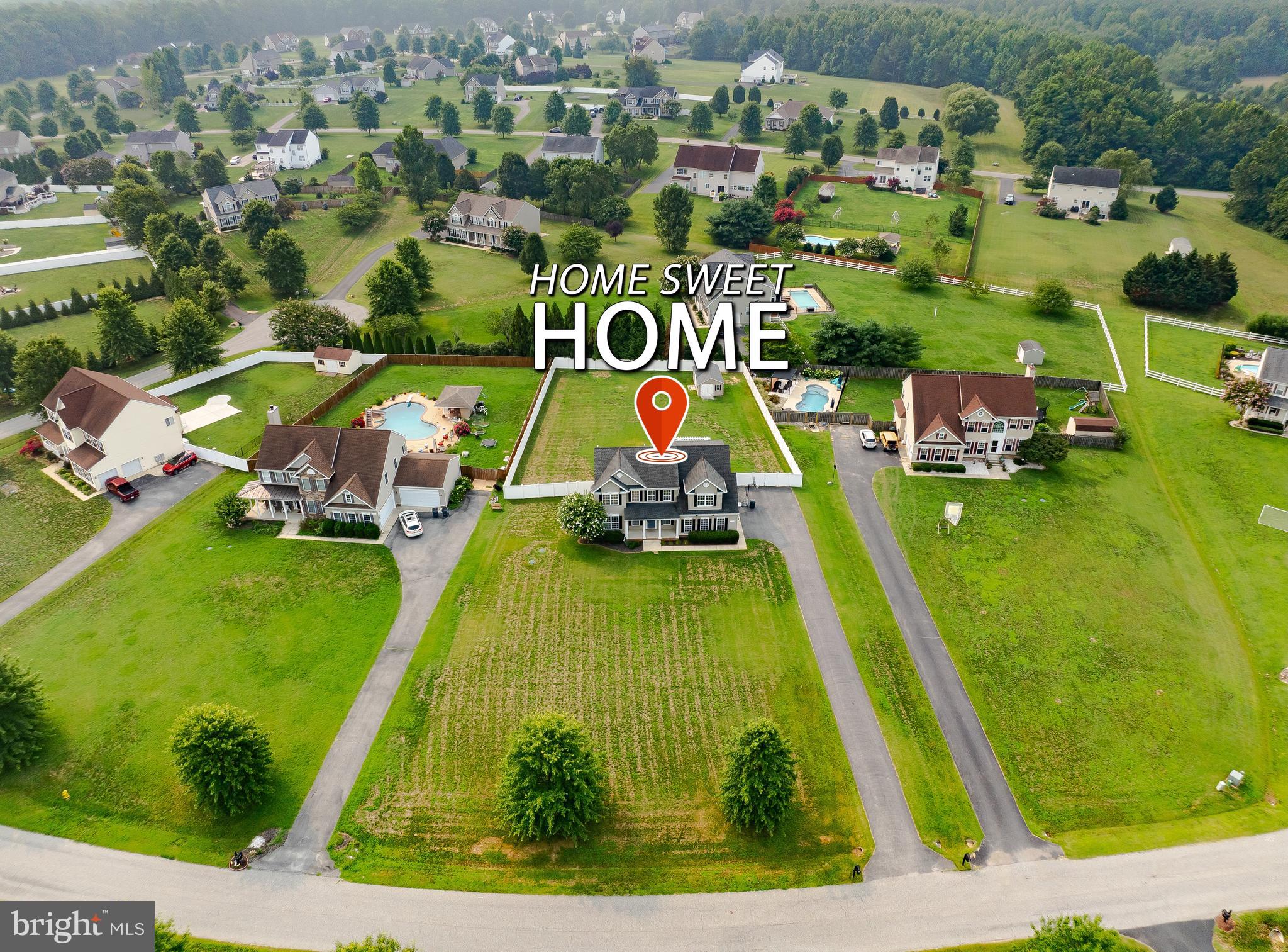 Welcome to  21395 Fairwood Ct., an exceptional home offering  over 3,500 square feet of finished living space  on 0.85 acres in one of Leonardtown's most sought-after neighborhoods. Perfect for those looking to spread out and lay down roots. This spacious  4-bedroom, 3.5-bath home combines generous living areas, thoughtful updates, and a picturesque setting at the end of a quiet street near the cul-de-sac.

From the moment you arrive, you'll appreciate the welcoming community—where neighbors gather for evening walks, children ride bikes, and the sense of home extends well beyond the property lines.

Inside, the updated kitchen serves as the heart of the home, featuring a large center island with a built-in beverage refrigerator, beautiful finishes, and durable tile flooring that flows into the bright, bumped-out breakfast area overlooking the backyard. Multiple living and entertaining spaces provide the flexibility today's buyers are looking for, whether hosting family gatherings or enjoying everyday life.

Step outside to your private backyard retreat. The fully fenced, level yard offers plenty of room for children, pets, gardening, or outdoor games, while the expansive deck and covered patio beneath a pergola create the perfect spaces for entertaining or relaxing. A large storage shed provides additional room for lawn equipment, tools, and seasonal storage.

Upstairs, the oversized primary suite is a true retreat, complete with a spacious walk-in closet featuring laundry hookups for added convenience. Three additional generously sized bedrooms, each with ample closet space, complete the upper level.

The finished basement expands the home's versatility with a spacious recreation area, full bathroom, and a bonus room—ideal for a home office, fitness room, playroom, hobby space, or guest accommodations. An unfinished storage area ensures you'll have room for everything. Completing the home is a generously sized side-load two-car garage. 

Offering the space to grow, the updates buyers appreciate, and a location that's consistently in demand, 21395 Fairwood Ct.  delivers the ideal combination of comfort, functionality, and community. If you've been searching for a home that offers room to spread out without sacrificing convenience, this Leonardtown property is one you won't want to miss.