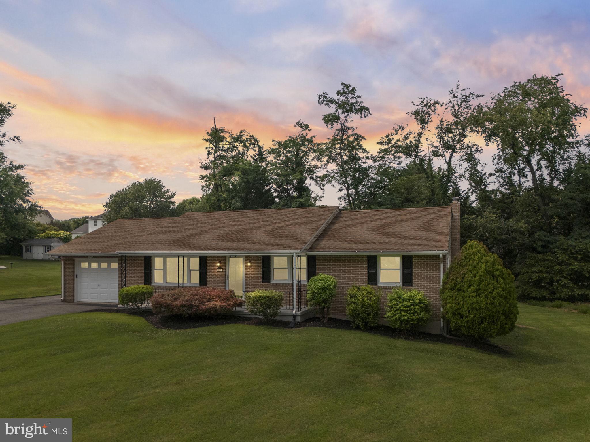 Welcome to 527 Stratford Road, a beautifully maintained brick rancher situated on a spacious, level lot in Fallston. This 3-bedroom, 2 full bath home offers the convenience of one-level living with generous indoor and outdoor spaces to enjoy.

The bright living room features hardwood flooring, recessed lighting, and a large picture window that fills the home with natural light. The kitchen offers abundant cabinetry, newer stainless steel appliances, wall oven and microwave, and direct access to the rear deck - perfect for everyday living and entertaining.

The primary bedroom includes hardwood floors, ample closet space, and a private full bath. Two additional bedrooms and a second full bath with jacuzzi tub complete the main level.

The finished lower level provides an expansive recreation room with a natural gas fireplace, offering endless possibilities for a media room, game room, home office, fitness area, or hobby space. There is  a laundry area with washer and gas dryer. Large utility room provides additional storage and an upgraded electrical service panel. 

Outside, enjoy the oversized yard with mature landscaping, a rear deck, and plenty of open green space. A spacious detached outbuilding provides exceptional flexibility for storage, workshop space, lawn equipment, or recreational gear. Thoughtfully designed with garage-style access and multiple entry points, it offers endless possibilities to suit your needs. Roof is under 10 years old and all windows have been recently replaced. The attached garage  has and additional upgraded electrical service panel, and stainless steel sink. The  extended driveway provides ample parking. Just minutes from Fallston schools, shopping, dining, parks, and commuter routes while offering the space and privacy you've been searching for.