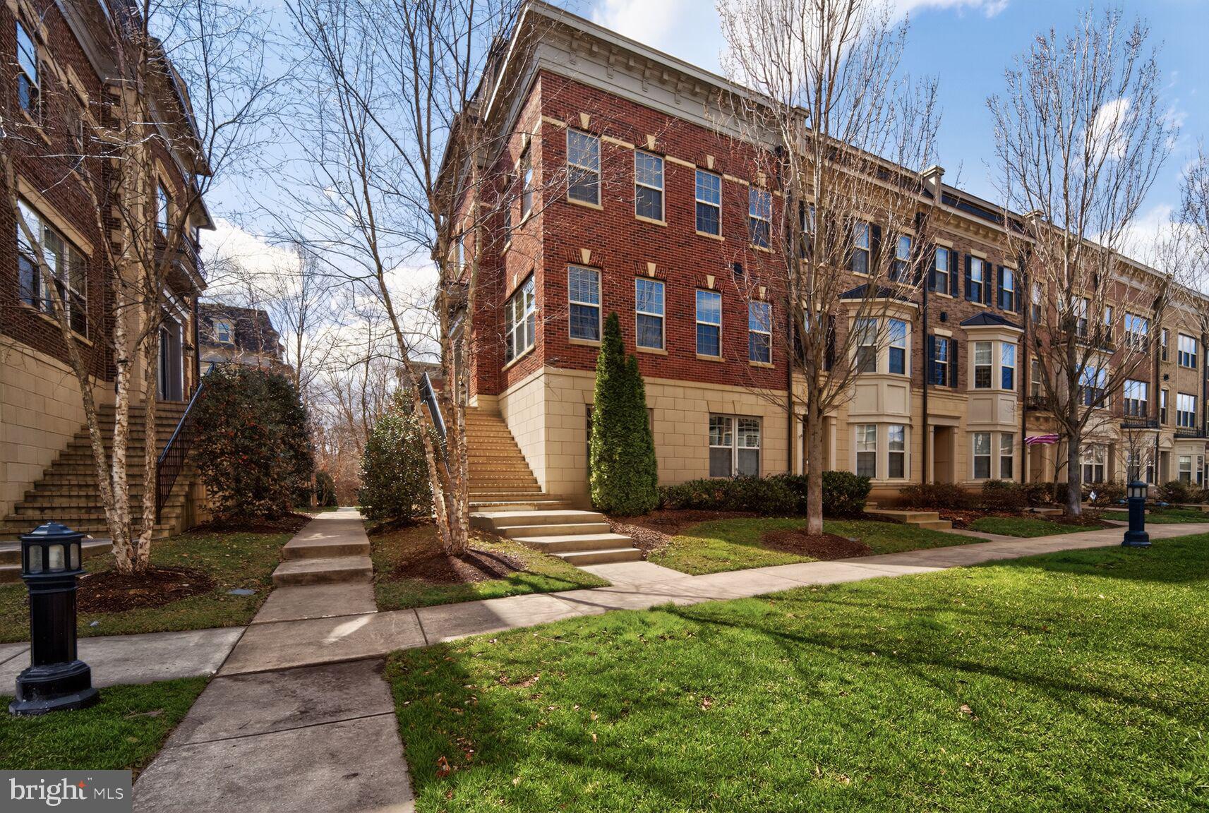 NEW PRICE and opportunity to take advantage or a VA loan assumption at 4.6%!!! 
Discover refined living in this exceptional end of row Modern Brownstone town-home, ideally located in the sought after Potomac Overlook community near National Harbor. Built in 2013, this beautifully appointed residence offers 4 spacious bedrooms, 4.5 baths, and thoughtfully designed living spaces that blend sophistication, comfort, and functionality.
Step inside to a light filled interior featuring gleaming hardwood floors and high ceilings that create an airy, elegant ambiance throughout. The gourmet kitchen is a true showpiece—designed for both everyday living and entertaining with a large granite topped center island seating four, premium stainless steel appliances, a double oven, recessed lighting, and abundant cabinetry. The open concept kitchen and dining area flows seamlessly into the expansive living room, where walls of windows frame tranquil, park like views and a fireplace adds warmth and charm.
Each bedroom is generously sized and includes walk in closets, offering exceptional storage and privacy. The entry level bedroom provides flexible living options, ideal for guests, a private home office, or a fitness space. Upper level laundry adds everyday convenience.
Outdoor living is equally impressive, highlighted by a private roof deck terrace with a view of the Potomac River, perfect for morning coffee, evening relaxation, or entertaining under the stars. Situated in the middle of a large oval lawn common-area with thoughtful landscaping, sidewalks, and street lighting enhance the welcoming neighborhood feel. An oversized attached garage, additional guest parking, secure gated entry, and an integrated fire detection system offer both convenience and peace of mind. This residence delivers the perfect blend of upscale style, modern comfort, and an unbeatable location close to waterfront dining, shopping, and entertainment. An exceptional opportunity to own a sophisticated town-home sanctuary in one of National Harbor’s most desirable communities.