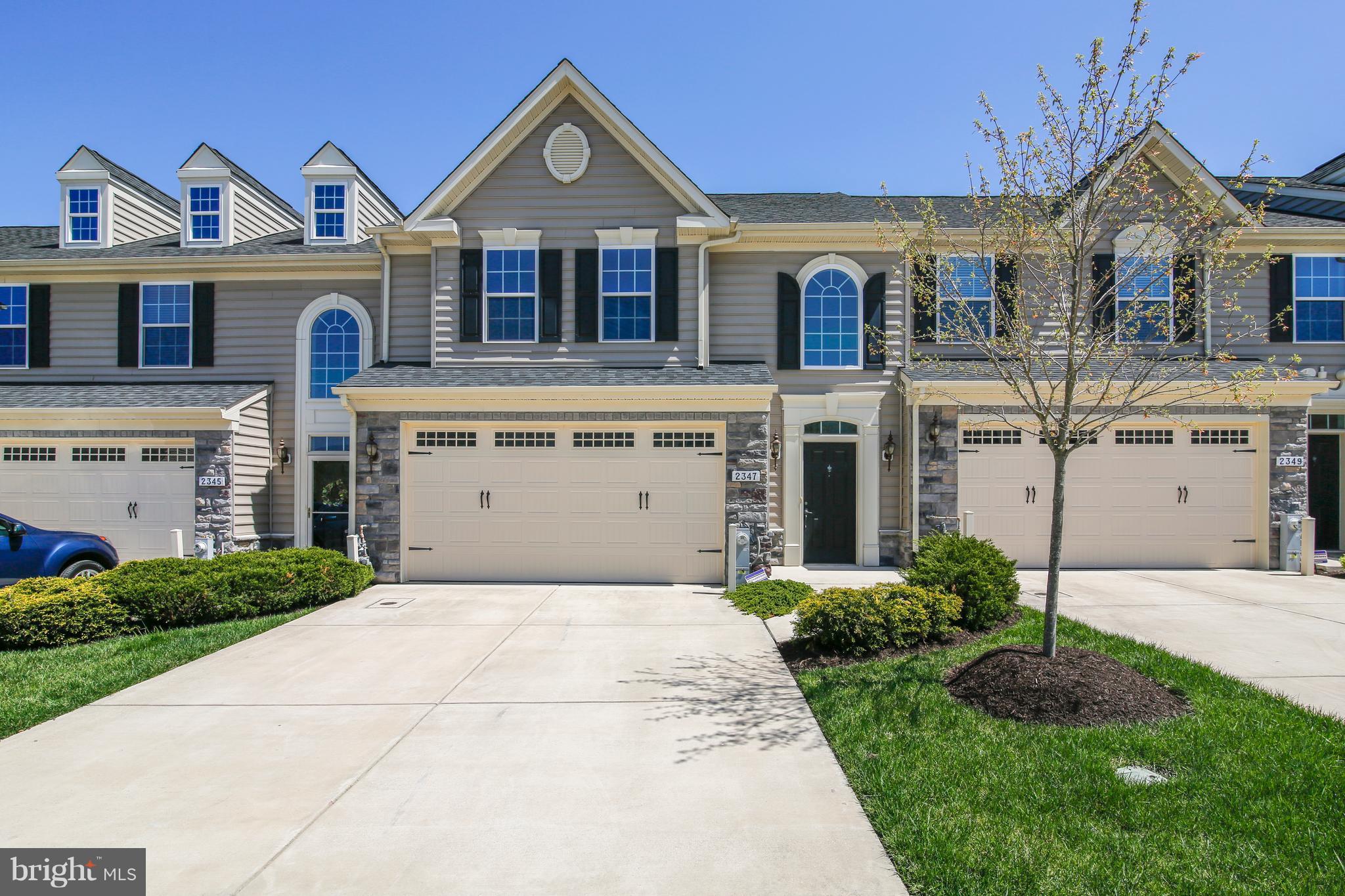 Easy to show! 55+ community. 3BR villa backing to open area. Easy main floor living with open-concept living/dining/kit + sunroom option. Vaulted ceiling. Large deck with line for grill. 1st floor master. Upper level has 2BRs, large loft area, bonus/craft room and bath. Huge fin L/L with bath rough-in and storage. Pool, walking trail, fitness center.