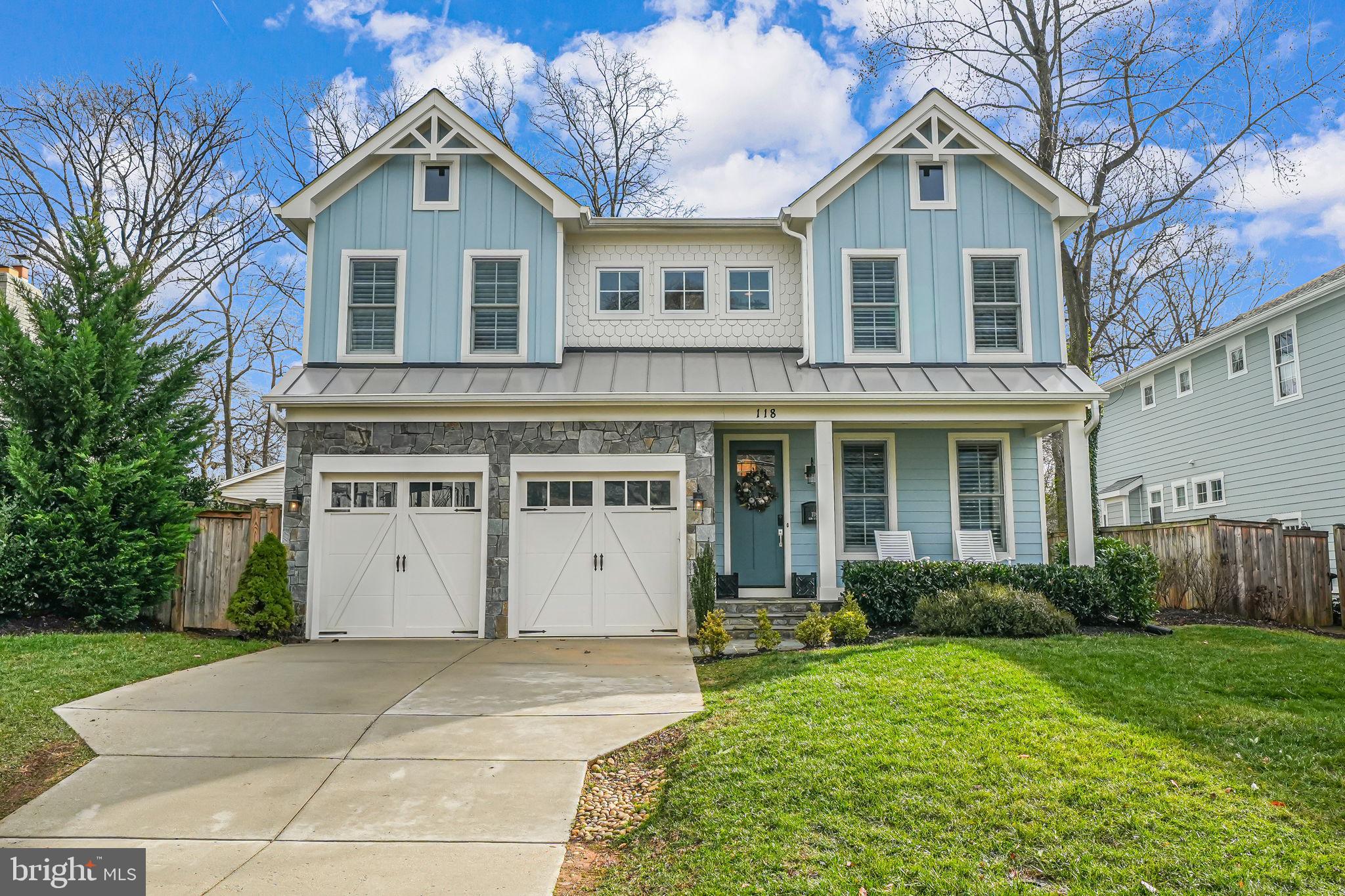 Welcome to 118 Elm St SW, a stunning 6-bedroom, 5-full, 2-half-bath Monarch custom home built in 2019 in the heart of Vienna. This exquisite home seamlessly blends modern luxury with timeless elegance, sparing no detail or accent. 

As you enter, you're greeted by a gleaming entryway with oak hardwood flooring. To your right, a private home office with custom glass doors bathes in natural light, creating an inspiring workspace.

Proceeding through the entryway, you'll find a formal dining area featuring an accent wall, leading into the open-concept living room and kitchen. The gourmet kitchen is a chef's dream, equipped with top-of-the-line Monogram stainless steel appliances, including a six-burner gas range with matching hood, an oversized refrigerator and freezer, and a hidden under-cabinet Sharp drawer microwave and dishwasher. Quartz countertops, highlighted by a waterfall island, complement the neutral marble backsplash and custom shaker cabinetry. The cabinetry is thoughtfully designed with various drawers and shelving systems, ensuring an organized kitchen and pantry, complete with a prep sink and trash drawer. The kitchen sink overlooks the flat, fully fenced backyard, and a cozy breakfast area under a gorgeous light fixture opens into the grand living room, all illuminated by recessed lighting. The living area boasts a stone gas fireplace, providing warmth and ambiance.

Adjacent to the living room, a discreetly placed half bath and a laundry/mudroom with storage cubbies and a utility sink offer convenience, with direct access to the garage.

Ascending the grand staircase, accented by a modern light fixture, you'll arrive at the primary owner's suite. Double doors open to an oversized room with plush carpeting and large picture windows that flood the space with natural light. The suite includes a generous walk-in closet with ample shelving and clothing racks. A sitting area and space for a king-sized bed along with additional furnishings complete the primary suite. The luxurious primary bathroom features gleaming marble tiles, dual vanities with oversized mirrors, modern fixtures, a standalone tub, an oversized tiled shower with a glass door, and a private commode closet.

This level also houses three additional ensuite bedrooms and bathrooms, plus a bonus bedroom, totaling five bedrooms upstairs. Each room is generously sized, with ample closet space, recessed lighting, and abundant natural light. A large linen closet adds to the floor's convenience.

The fully finished basement offers a spacious living area adaptable to your needs, a dedicated workout room with rubber flooring and recessed lights, and an additional sizable room adjacent to the half bathroom and utility room, ideal for exercise equipment. A sixth bedroom with a walk-in closet and full ensuite bathroom provides comfortable accommodations for guests. The basement features tall ceilings and a walk-out entrance to the backyard.

Situated in the vibrant town of Vienna, this home offers access to a wealth of amenities. Vienna is renowned for its storied history, lively community events, and a network of parks and paths. Enjoy the atmosphere along Maple Avenue, featuring specialty shops, an array of restaurants, family-run businesses, and small stores. 

Outdoor enthusiasts will appreciate the proximity to the Washington & Old Dominion Trail, ideal for bicycling, walking, running, and skating. 

With easy access to major routes and a strong sense of community, Vienna provides a perfect blend of small-town charm and modern conveniences.
