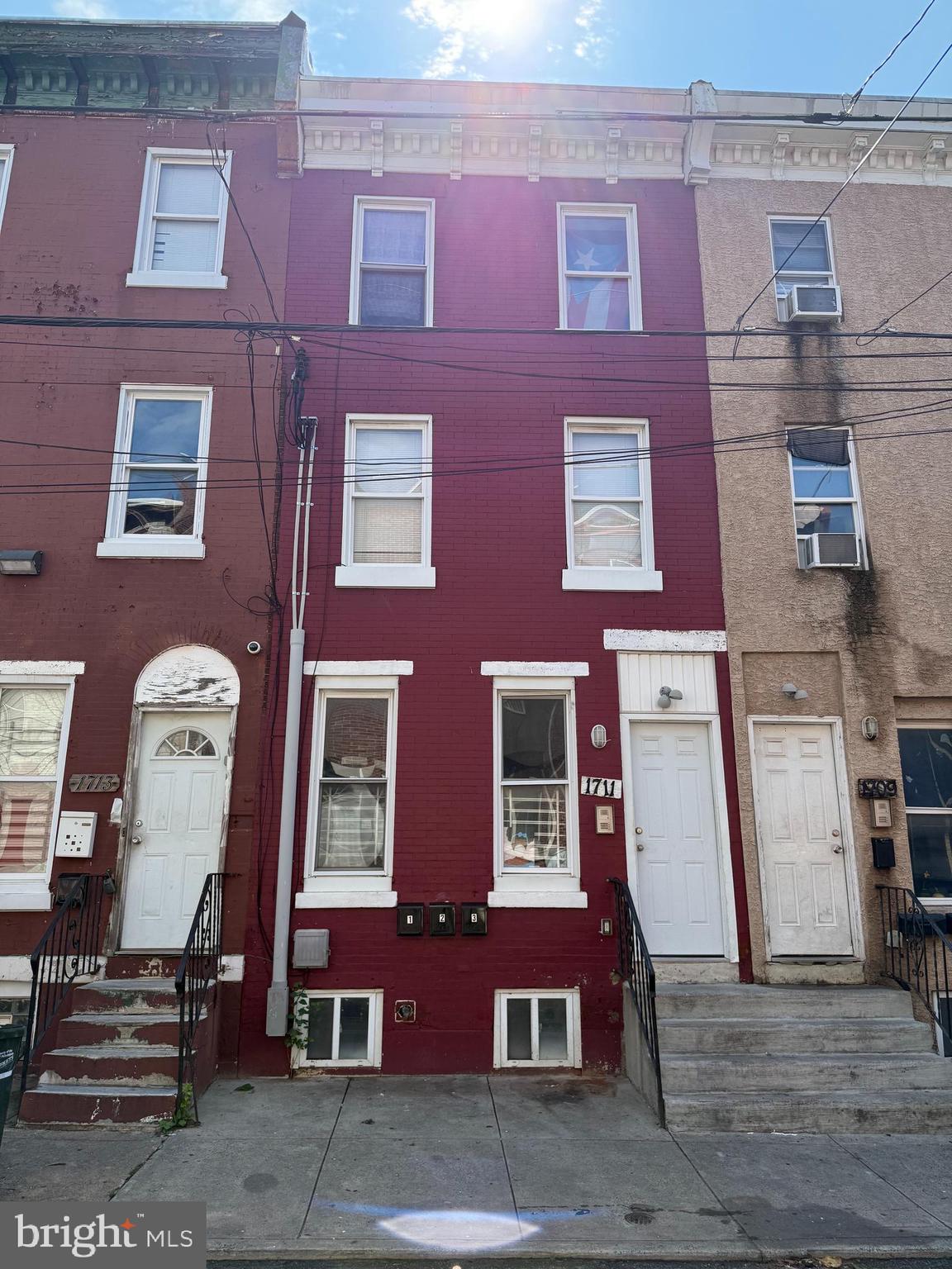 Prime Investment Opportunity:offers a fantastic investment opportunity in the desirable Temple University area. With a strong income , the property generates a gross monthly income of $3,000 and a gross annual income of $36,000. Tenant Convenience :each of the three 2-bedroom, 1-bathroom units boasts desirable amenities including a full kitchen and an in-unit washer and dryer  .  These  " all electric" separately metered utility units  providing ease of management and potential cost savings for the new owner.Excellent Location: located near Temple University, which residents benefit from a very walkable neighborhood  with extra private school security staff. with excellent transit options . Each unit has vibrant fresh paints adorned upon  each of the the Three- 2 bedroom/1 bath units. Decorum include fireproof hardwood floors, complete fully featured kitchens with compact washer and dryer appliance with a classic but modern appeal.The property's "Straight Thru" architectural style is typical of the area, and the proximity to Temple University ensures a reliable pool of potential tenants to screen from.This triplex offers a stable and attractive income stream due to its desirable location and sought-after amenities.