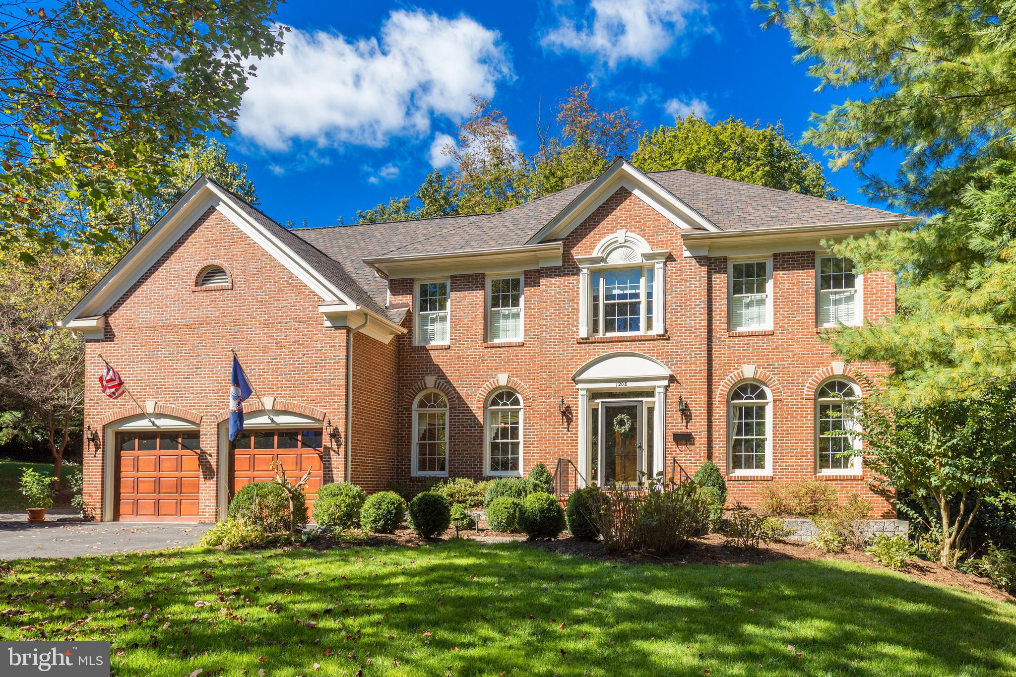 Plenty of Space to Work from Home! Handsome brick colonial in the heart of McLean just a block to the McLean Central Park with tennis and basketball courts ,and Library and Community Center.   This mint condition light filled center hall colonial offers approximately 5500 sf of living with 9 ft ceilings.  The main level floor plan is perfect for entertaining with great flow from room to room including French Doors to a large deck.  Enter a gracious two story foyer flanked by the dining and living rooms and leads to the family room with a wood burning brick fireplace.  The updated kitchen opens to the breakfast nook and family room and has Thermador and Jenn Air stainless steel appliances.  In addition there is a Butlers Pantry, food pantry and porcelain farm sink.  Off the kitchen there is a mudroom/laundry room and two car garage.  The corner library has great views of the backyard.  The upper level has a total of five bedrooms and three full baths.   The master suite includes a sitting room with a walk-in closet, vaulted ceiling, an updated luxury bath with seamless glass shower and soaking tub, two linen closets. The walkout lower level has new carpet and new sliding glass door and has a large recreation room with wood burning fireplace and a bedroom and full bath. In addition, there is a storage room with built-in shelves and additional storage in two storage closets, the utility room and under the stairs.  The backyard is totally fenced and there is a dog cage under the deck.  The exterior includes a flagstone and brick walkway and front stoop and many specimen trees, shrubs and perennials including a large Maple, Dogwoods , Cypress, Pines and Cherry trees.  Shrubs include Boxwoods, Azaleas, Rhododendrons. The perennials include Hydrangeas, Jonquils, Tulips and Day Lilies.  Updates include: Freshly painted inside and out *  Belmont luxury shingle roof * New carpet in family room and lower level * New light fixtures in foyer, upper level hall and kitchen * Repaved driveway * New stone retaining wall in front yard * Solid wood garage doors * Renovated kitchen, butlers pantry and master bath in 2011 * Upgraded door hardware on main and upper levels.  *******This residence is located just one block McLean Community Center, Library and Central Park with basketball and tennis courts, with a walking path that goes all the way to Georgetown Pike. It is very walkable to downtown McLean shops and restaurants and just a few minutes drive to all that Tysons and the New Boro have to offer including the Silver Line Metro McLean Station and the New Wegmans,   Also, it is a quick commute via 495 and the George Washington Parkway to Washington, DC, Bethesda MD, Amazon National Landing and the Reston/Dulles Technology Corridor and centrally located between Dulles International and Reagan National Airports. For nature enthusiasts nearby Scotts Run Nature Preserve, Turkey Run Park and Great Falls National Park offer miles of hiking trails and spectacular river views.