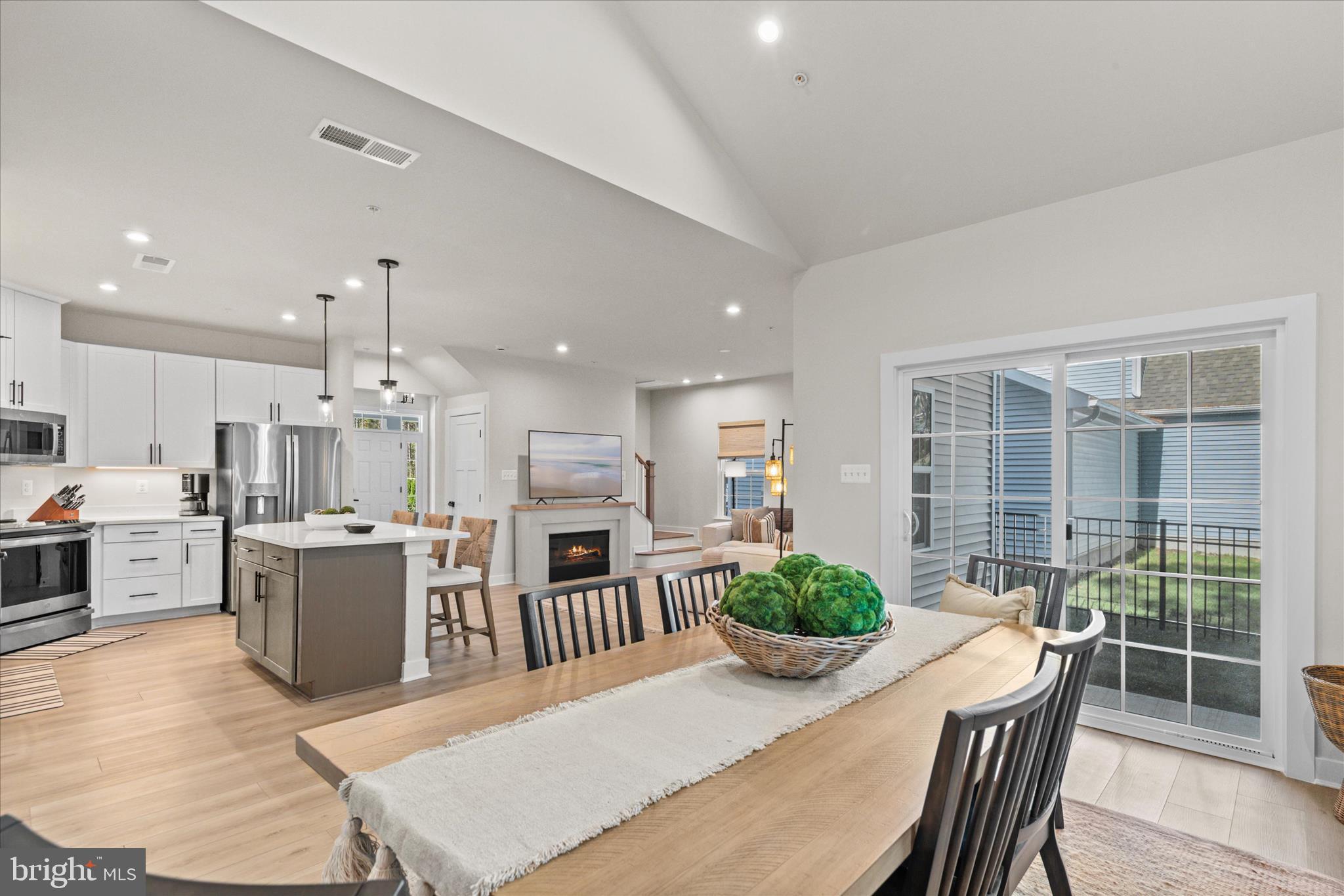 Welcome to 12105 Landings Boulevard,  this  beautiful Coastal Home offers 4-bedroom, 2.5-bath and shows like a model.  Wide-plank flooring flows throughout the main living areas, complemented by custom Hunter Douglas shades and professionally installed window treatments by Designing Windows.

This nearly new home is now one of the best values in the Bayside community and the lowest priced single family home currently available.  If you've been waiting for the right opportunity to own a single family in this highliy sought after neighborhood, now is the time to schedule your private showing. 

A welcoming front porch sets the tone as guests arrive. Inside, the spacious foyer opens to a private study with French doors. To the left, you’ll find a convenient powder room, coat closet, and an oversized laundry room.

The foyer leads into the inviting great room and sun-filled morning/dining area, creating an open and airy layout ideal for both entertaining and everyday living. The great room flows seamlessly into the kitchen, offering a warm and functional space for gatherings or relaxed evenings at home. The kitchen features a large center island, ample cabinetry, and a pantry for additional storage.

Upstairs, three spacious guest bedrooms accompany a generous owner’s suite with a walk-in closet and luxurious bath featuring a soaking tub.

Outside, the backyard is already complete with sod, an irrigation system, and a wrought iron fence—making outdoor living easy from day one. Perfect spot for a pergula and paved patio. Private and backs to trees and nature. 

Located less than 5 miles from downtown Ocean City, close to historic Berlin, and just 6 miles from Assateague Island, this home offers the perfect blend of convenience and coastal lifestyle. Enjoy easy access to the beach, boardwalk, dining, and the natural beauty of the area. Community amenities are already complete and include a beautiful clubhouse with fitness center, indoor and outdoor pools, tennis courts, playground, nature trails, kayak launch, crabbing pier, and stunning bay views throughout the neighborhood. Golf carts are permitted, making it easy to enjoy everything this hidden gem has to offer.

Perfect as a full-time residence, coastal retreat, or rental investment property, this barely lived-in home is move-in ready and offers peace of mind with remaining builder warranties. Just in time for summer and all the lifestyle this wonderful community has to offer.