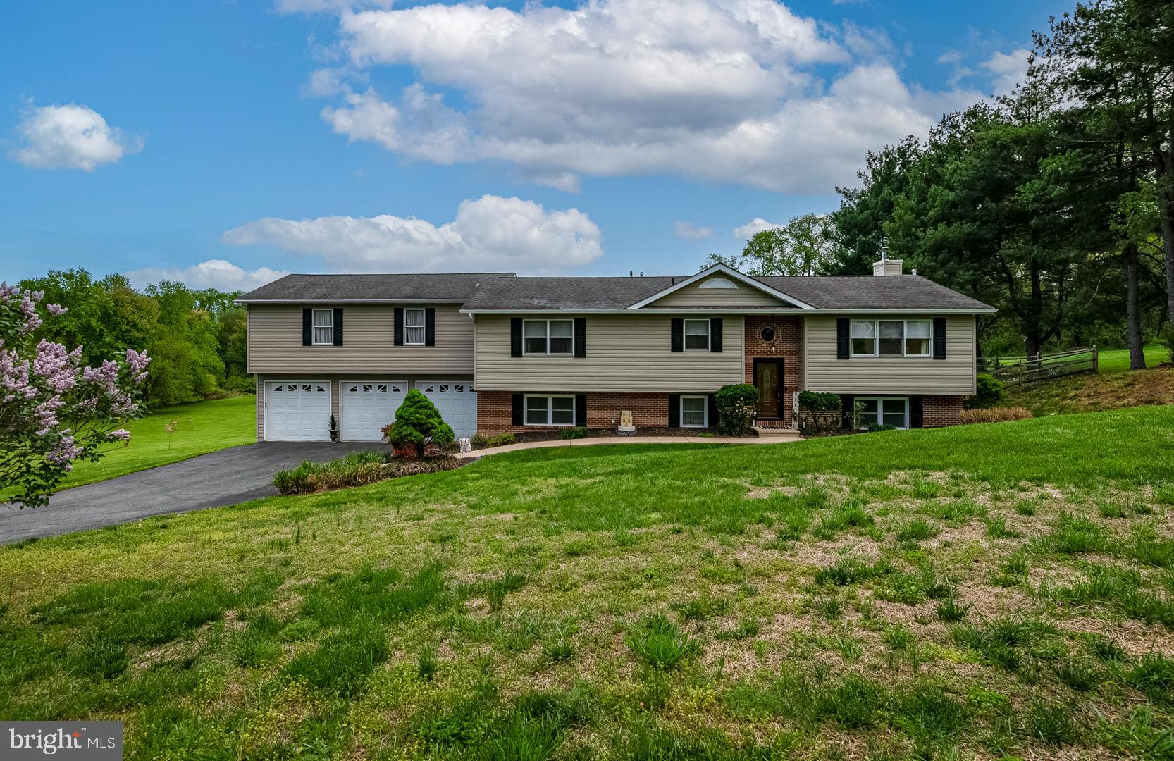 This Stunning, Updated Home sits on almost 2.5 Acres in the Water- Oriented community of Saint John's Manor. The gorgeous custom Kitchen features Granite tops, Stainless appliances, and under cabinet lighting. The Living Room & Dining area are open to the Kitchen and Sliders that lead to a New Oversized Deck with Covered Hot Tub. The Primary Bedroom is oversize and has His/Hers closets. The spacious hall bath has been beautifully renovated with Custom Double Vanity and Tile & Glass Shower. The second bedroom on this level has a Bath En-Suite. The Lower Level includes a Large Third Bedroom and Third Full Bathroom, Family Room with pellet stove and large mud room with laundry that accesses the original Garage. The owner added 3 more Garage Bays, (perfect for storage of water craft) with a large one bedroom In-Law Apartment above. Due to health reasons the apartment was not completed. However, several materials to complete the apartment are on site. The Park-Like setting invites you to enjoy outdoor activities on the deck and there is a cool Water Feature and Koi pond. A Fenced area & Shed round out the Back Yard.
