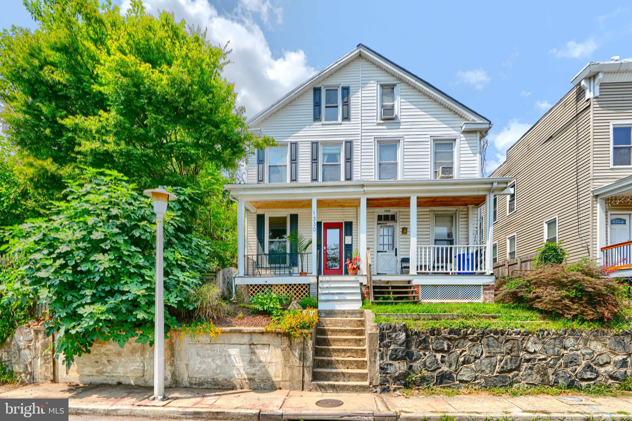 Custom-designed kitchen, spacious layout, and a backyard oasis! This Hampden gem has it all. This 4BR, 2.5BA home offers 1,575 sq ft across three levels, including a large primary bedroom with a bonus office or workout space. The thoughtfully renovated kitchen features a smart layout and designer touches throughout. Enjoy central air plus a third-floor split system, a front porch, and a separate dining room.

The main level features hardwood floors, a spacious living room, and the dining room opens to a charming kitchen! The kitchen has been updated with butcher block counters, a ceramic farm sink, stainless steel appliances, double oven/ stove with hood vent, tile backsplash, open shelves, and plenty of cabinet space. A half bathroom and laundry area is conveniently located on the main level just past the kitchen.

The second level of the home has two full bathrooms and two spacious bedrooms. Two more bedrooms are located on the third floor.

Out back, you’ll find a private fenced yard with patio, pond, grassy play space, and a firepit, plus a rare second deeded lot with a garage/workshop and parking for 2+ cars. The street is quiet and friendly, yet just blocks from The Avenue, light rail, Union Mill, and more. It’s a peaceful, flexible home base with nature out back and city life out front.

Recent upgrades and improvements include a brand new shingle roof with transferable warranty, new refrigerator in 2026, and a new dishwasher in 2025.