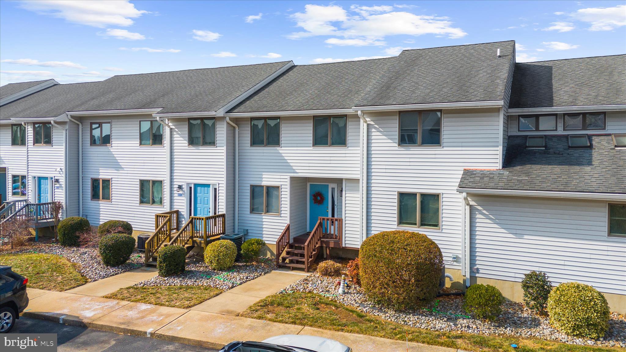 Welcome to 1305 Marion Quimby Drive in Stevensville, a rare waterfront opportunity offering stunning views, low-maintenance living, and direct access to the best of Kent Island’s coastal lifestyle. This beautifully positioned 2-bedroom, 2.5-bath home sits right along the water, delivering breathtaking panoramic views you’ll enjoy from sunrise to sunset. Whether you’re sipping your morning coffee or unwinding in the evening, the peaceful waterfront setting creates the perfect backdrop for everyday living. Step outside and you’re immediately connected to the scenic waterfront walking trail ideal for morning jogs, sunset strolls, or simply soaking in the shoreline beauty. For boating enthusiasts, the property also includes a deeded boat slip, making it effortless to get out on the Chesapeake Bay whenever the mood strikes. Inside, you’ll find a thoughtfully designed layout with two spacious bedrooms, each offering privacy and comfort, plus two full bathrooms and a convenient half bath for guests. The home blends relaxed coastal charm with functional living spaces perfect for year-round enjoyment or a weekend retreat. Water views. Boat access. Community pool. Community fitness center and clubhouse. Walkable waterfront lifestyle. This is Kent Island living at its finest.