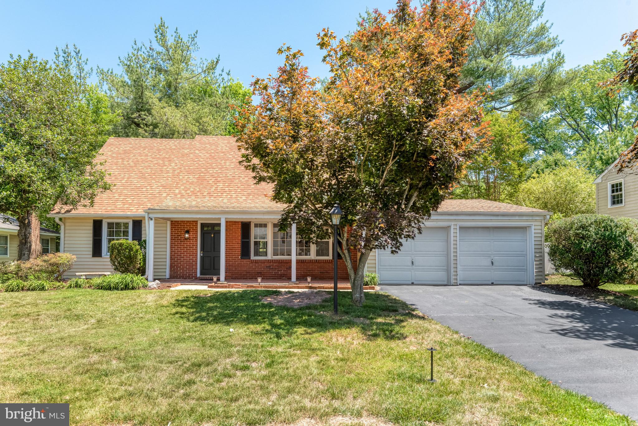 ** Welcome to this expanded Ashley model Cape Cod, perfectly situated on a quiet street in the highly desirable Greenbriar community. This home offers the space, updates, and charm.  A rear addition adds approximately 300 square feet, creating a spacious great room anchored by a beautiful brick fireplace. The perfect spot for relaxing or entertaining. This extra living space truly sets the home apart from the typical Ashley model. With 4 bedrooms and 2 full bathrooms, this home offers flexibility for a variety of living needs. The lower-level bathroom has been newly renovated, and the home has been freshly painted throughout.  Brand new LVP flooring flows through the main living areas, while new carpet in the bedrooms adds comfort where it counts.   A rare 2-car garage and a layout that balances openness with functional living spaces.  All of this in the sought after Greenbriar neighborhood known for its convenient location near shopping, dining, major commuter routes, and just minutes to Dulles Airport and NO HOA.   Move-in ready, expanded, and located on a quiet street, this one check all the boxes. Don’t miss it.