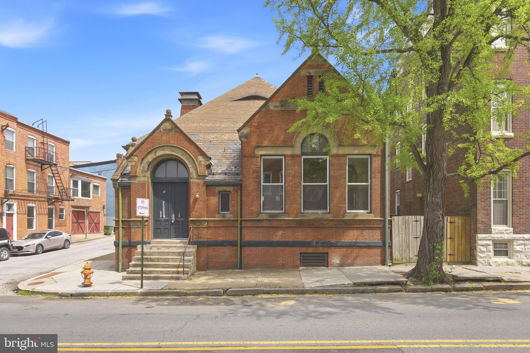 Prominently positioned along Light Street in the heart of Federal Hill, 1401 Light St represents a rare opportunity to acquire a historic, well-located commercial asset with flexible zoning and strong long-term usability. Originally constructed as one of the first branches of the Enoch Pratt Free Library in Baltimore, the property carries architectural significance and a level of prominence that is increasingly difficult to replicate in today’s market. Zoned OR-1 (Office Residential), the building supports a wide range of professional and institutional uses, including professional offices or headquarters, medical or wellness services, residential care facilities (ALF), child or adult day care, and live/work configurations. 
The structure also offers the potential for residential or mixed-use conversion, subject to zoning approval. The building features a functional layout with high ceilings, substantial natural light, and solid construction, including the possibility of adding a second floor within the existing structure to increase the usable square footage. Its scale and character provide a strong foundation for a user seeking both presence and practicality. Please see the attached rendering photos for examples of various use-case options.
The location benefits from consistent foot traffic, immediate access to downtown Baltimore, and proximity to dense residential and retail amenities. Federal Hill remains one of the city’s most stable and desirable submarkets, supporting both business operations and long-term value retention. This is a straightforward opportunity for an investor, developer, or owner-user seeking an adaptable building with historical character and enduring utility.