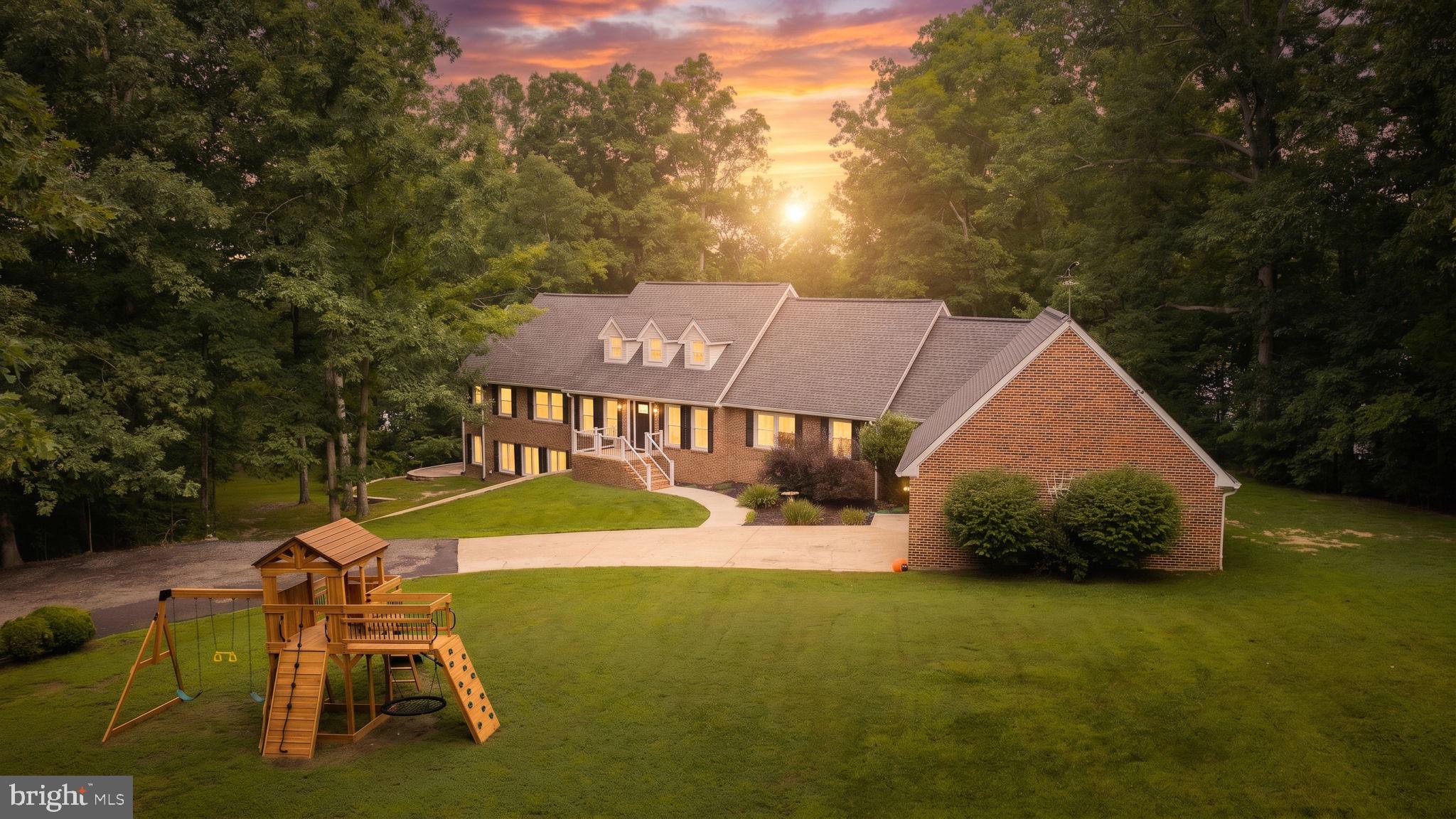 Set on 3.53 acres with 280 feet of deep water frontage on the public side of Lake Anna, this exceptional waterfront retreat in the gated Kelly’s Landing community delivers the ultimate lake lifestyle with unforgettable views. A concrete walkway leads to your private covered boathouse, complete with a sun deck, storage, double jet ski pad, and a waterfront gazebo—perfectly designed for long summer days on the water. An additional observation deck offers a front-row seat to breathtaking sunsets, creating an ideal setting for gathering, relaxing, and making lasting memories. This custom-built Vermont Timber Frame home, fully furnished and thoughtfully renovated in 2019, spans over 6,100 finished square feet across three levels with an open, light-filled design. Soaring 21-foot vaulted wood and beam ceilings anchor the main living space, while the chef’s kitchen impresses with an oversized 8x6 Carrara marble island, stainless steel appliances, and a walk-in pantry with integrated laundry. The lakeside primary suite offers direct deck access, vaulted ceilings, dual walk-in closets, and jetted tub and double vanity. A spiral staircase leads to a loft overlooking the main level, along with an additional bedroom and private bath. The walkout lower level is built for entertaining, featuring a spacious family room, separate recreation area with pool table, four additional bedrooms and two baths. Outdoor living is equally inviting, with a lakeside deck, dining gazebo, grilling area, and a patio with fireplace, plus a covered swing for quiet moments. Currently operating as a successful short-term rental with $160,000 in income in 2025, this turn-key property presents a rare opportunity for both personal enjoyment and investment. Whether hosting large gatherings or enjoying peaceful lake days, this home offers a lifestyle that brings people together in the best way. Located less than 2 hours from Washington, D.C., this home is perfect for even a quick weekend trip to get away and relax. Enjoy close proximity to local dining and favorites like Tim’s at Lake Anna, Moo-Thru for ice cream and mini golf, The Cove restaurant, and nearby marinas.