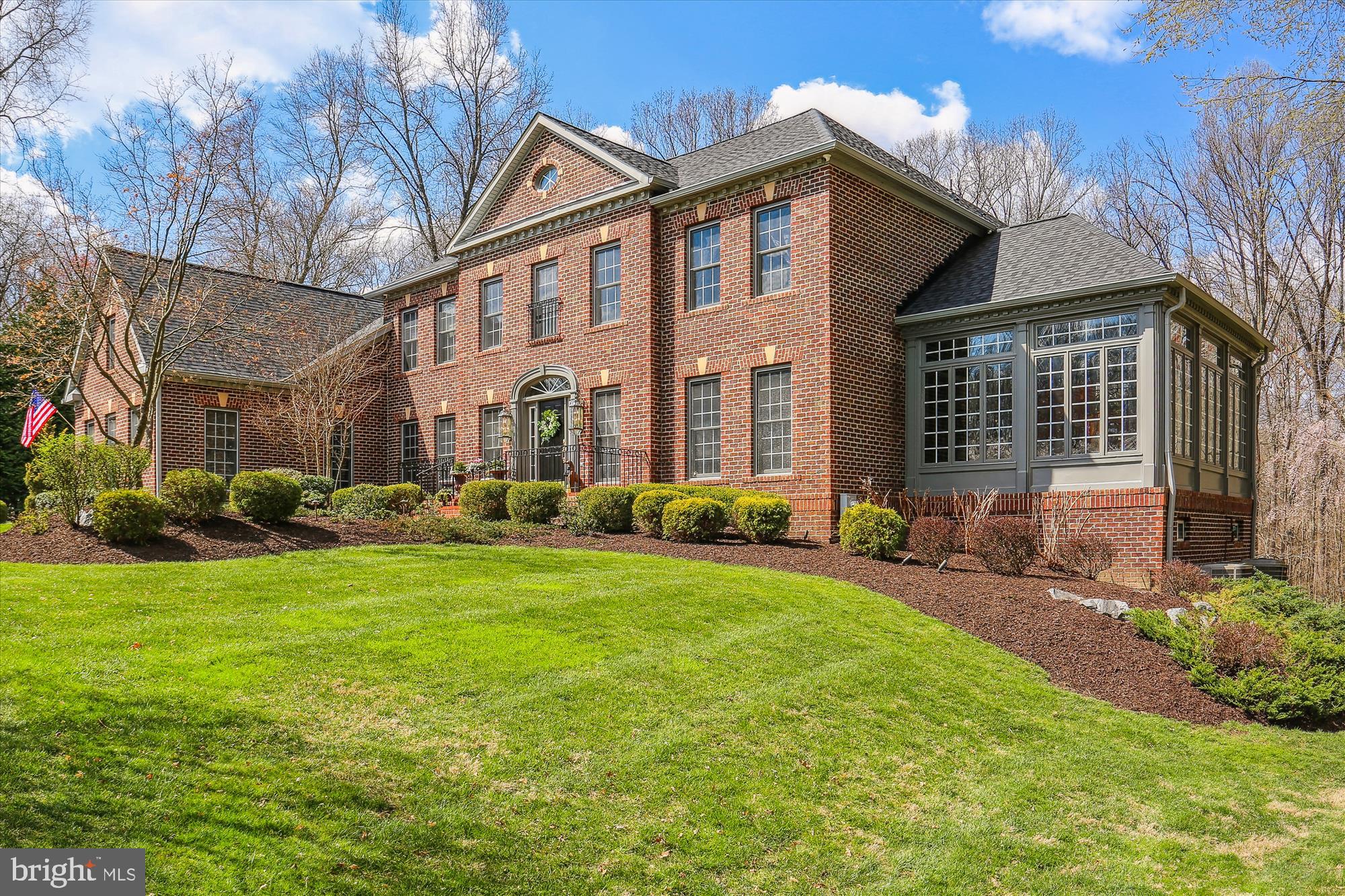 Nestled towards the end of a no-through street lined with Cherry trees - undoubtedly one of Montgomery County’s prettiest roads – and within a small enclave of estate homes with no HOA, sits this exceptional custom colonial that shows like a model home!  This home was thoroughly inspected from top to bottom, inside and out by Protec Inspections and is in excellent shape. You will be hard-pressed to find a home in better condition! 
As you enter, you are welcomed by a grand dual staircase and an elegant foyer that leads to the great room flooded with natural light. It boasts high, coffered ceilings, a serene view of your private grounds, and one of three fireplaces that serve as the room’s focal point. 
Much of the main level is covered in newly refinished warm wood floors that perfectly complement the white molding throughout and the kitchen's custom maple cabinets. Equipped with a large center island, Corian counters, a Thermador gas range, and built-in oven, a warming drawer, a wine cooler, and a breakfast bar, this kitchen provides ample counter and gathering spaces and is truly the heart of the home. 
An open-concept floorplan with traditional elements flows elegantly from room to room and onto the low-maintenance deck and balcony. It is designed for hosting and entertaining while simultaneously exuding a warm atmosphere that just beckons you to cozy up in the family room, enjoy afternoon tea in the conservatory, or have a cup of coffee in your morning room. 
Complementing the main level is a formal dining room, living room (or billiard room), office, half bath, and mud and laundry room with access to the 3-car side loading garage.    
Step upstairs to find the spacious primary suite with a sitting area, a  third fireplace, two walk-in closets (one that is sure to wow), and the primary bath with a jetted corner soaking tub, dual vanities, and a walk-in shower. There are 3 more bedrooms, all with roomy closets, and private en-suites.

On the lower level, you’ll find a lounge, suitable for a game room, or home gym complete with a full bath and walk-in closet. There’s an abundance of storage space or room to spread out, already framed and insulated and ready to be finished to meet your needs.  
This home's craftsmanship and attention to detail are exceptional, plus it offers much more than meets the eye at first glance. It has almost 6200 sq. ft. above grade, and well over 9K total. It is equipped with a whole house zoned Sonos audio system with individual volume control in most rooms (including garage and deck), a hardwired alarm system (burglary, fire, carbon monoxide, water sensors), professionally landscaped grounds with up-lights and underground sprinkler system, a hot tub, invisible fence, air purifier, new roof, updated 3-zone HVAC system, heat pumps with gas back-up… The well has a digital system, and an excellent yield at 6 gallons/minute - city water pressure without a quarterly bill! The property is partially protected by a forest conservation easement guaranteeing privacy and a lovely view year-round, yet still leaving plenty of room to throw a football or add a pool (concept plan available)! Don’t miss this rare opportunity to own this exquisite home. Schedule your private home tour before it's too late!