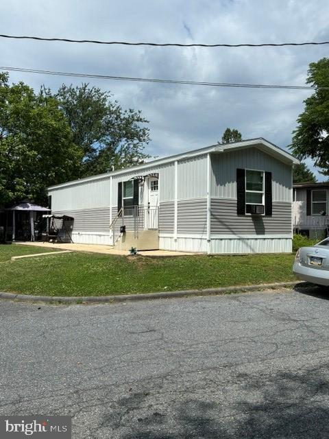 THIS ECONOMICAL 2 YEAR OLD MOBILE HOME IS IN EXCELLENT CONDITION.  IT FEATURES 2 BEDROOMS, LIVING ROOM, EAT-IN KITCHEN WITH ISLAND & 3 BAR STOOLS STAY, FULL BATH WITH WALK-IN SHOWER & LAUNDRY.  WOOD LAMINATE FLOORING & GAS FURNACE.  LOTS OF KITCHEN CABINETS & STORAGE.  ALL OF THE KITCHEN APPLIANCES & WINDOW COVERINGS STAY.  THE LOT RENT IS $350. & INCLUDES SEWER.  $25 EXTRA FOR A PET.  2 OFF-STREET PARKING SPACES.  THE NORTH EAST PARK IS NEARBY AND HAS MANY WALKING TRAILS, PLAYGROUND, TENNIS COURTS, BALL FIELD & A LAKE.  THERE IS NO AGE REQUIREMENT AT THE LINCOLN VILLAGE MOBILE HOME PARK.  ALL AGES ARE WELCOME!