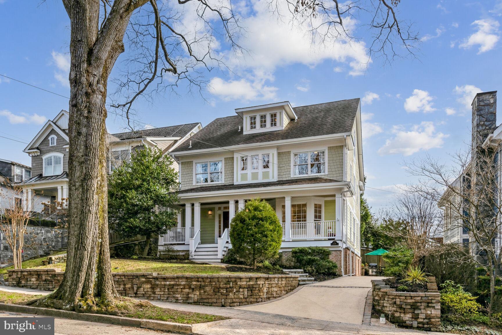 Welcome to your dream home nestled in the sought after Palisades-Kent neighborhood. This stunning home offers timeless features and impeccable craftsmanship with nearly 5,000 square feet of living space on 4-floors. The main level is perfect for entertaining guests and today’s modern living. Experience the light and airy ambiance of the open floor plan, abundance of windows and the sleek hardwood floors throughout. The gourmet kitchen, pantry and flexible mudroom area are a chef’s dream. The upper level features a luxurious owner's suite with a custom-built walk-in-closet, soaking tub, heated bath floor, balcony and three additional spacious guestrooms. The very top level could be the perfect second primary suite with its’ loft area, private bathroom, and large bedroom. Or the space could be used as an office wing as shown. The fully finished lower level is well suited as an in-law or nanny suite with both interior and exterior access. As you step on to the front porch you have a bird’s eye view of the tranquil neighborhood and will find it a peaceful spot to relax. Stepping out in back, you will discover a private oasis, complete with two terraced patios, perfect for outdoor gatherings and grilling in the built-in BBQ.  There is ample space to park on the large driveway 3 cars+ , or for guests to park on the quiet residential street.
Enjoy easy access to recreational venues, nearby shopping, top-notch dining, area Universities and all the amenities located in Spring Valley and The Palisades. This home is convenient to notable cultural landmarks across the Capital region and major commuter routes including Downtown and the Chain Bridge to Northern Virginia, making it an ideal location.